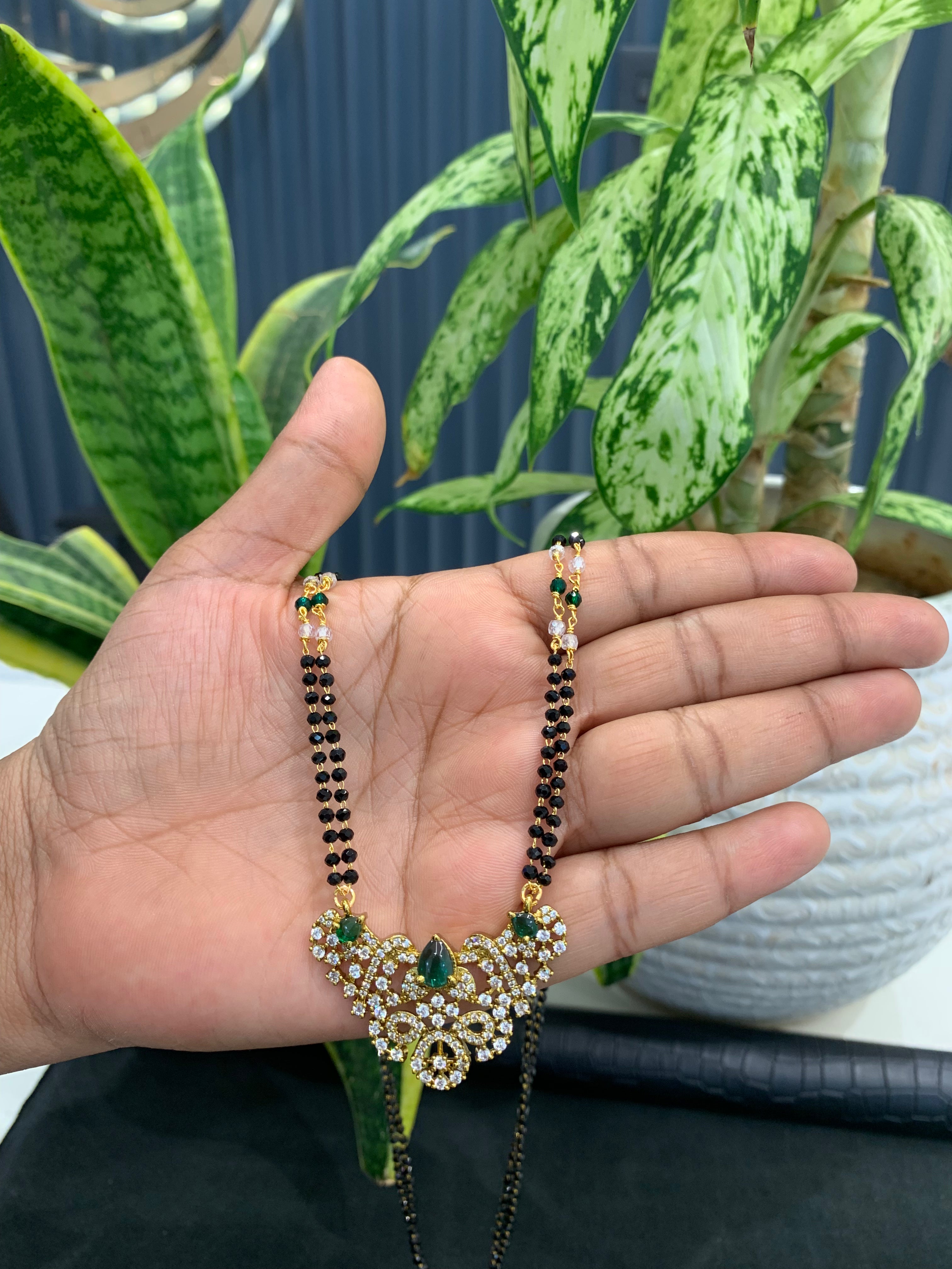 Beautiful stones pendant with handmaking black beads chain 24 inchs long