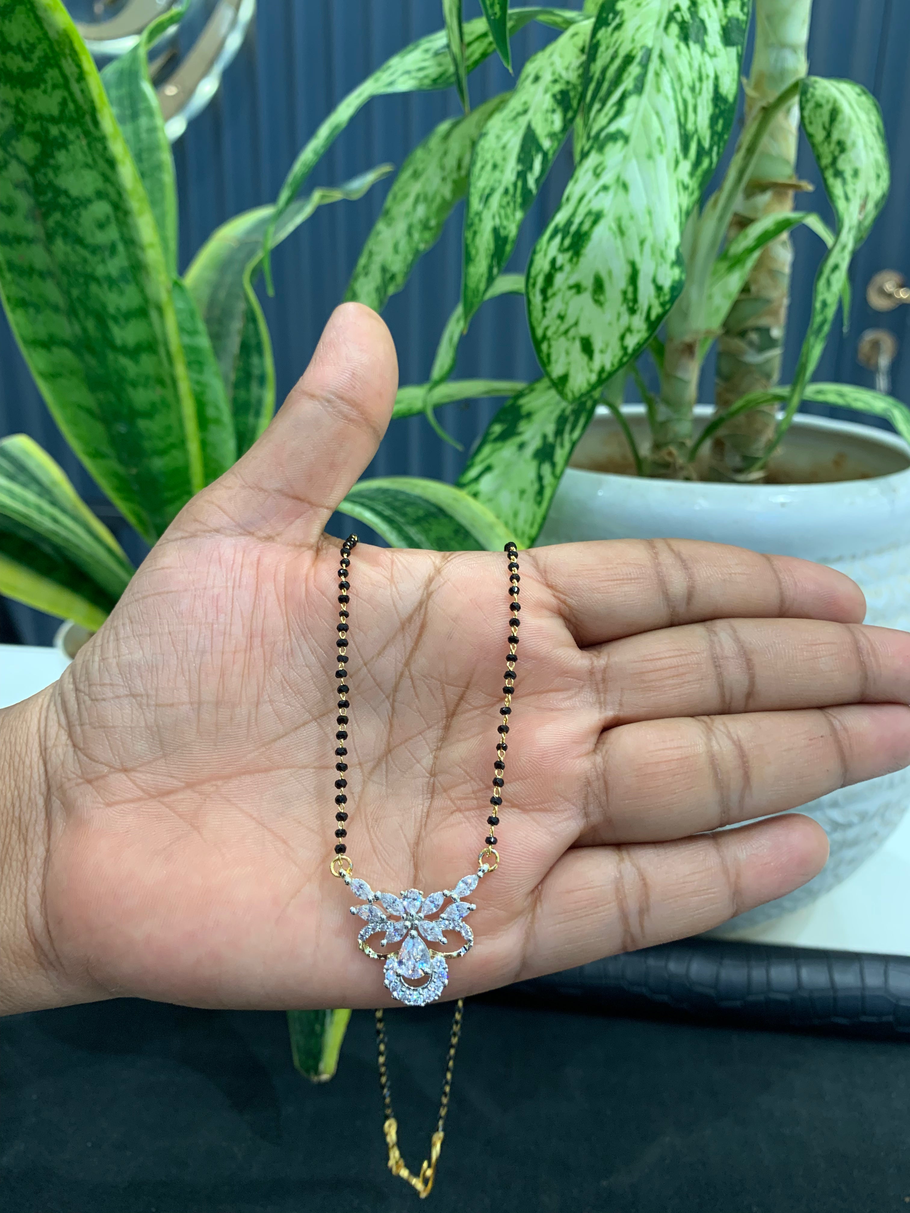 Beautiful Diamond Replica pendant with Blackbeads chain 18 inchs long