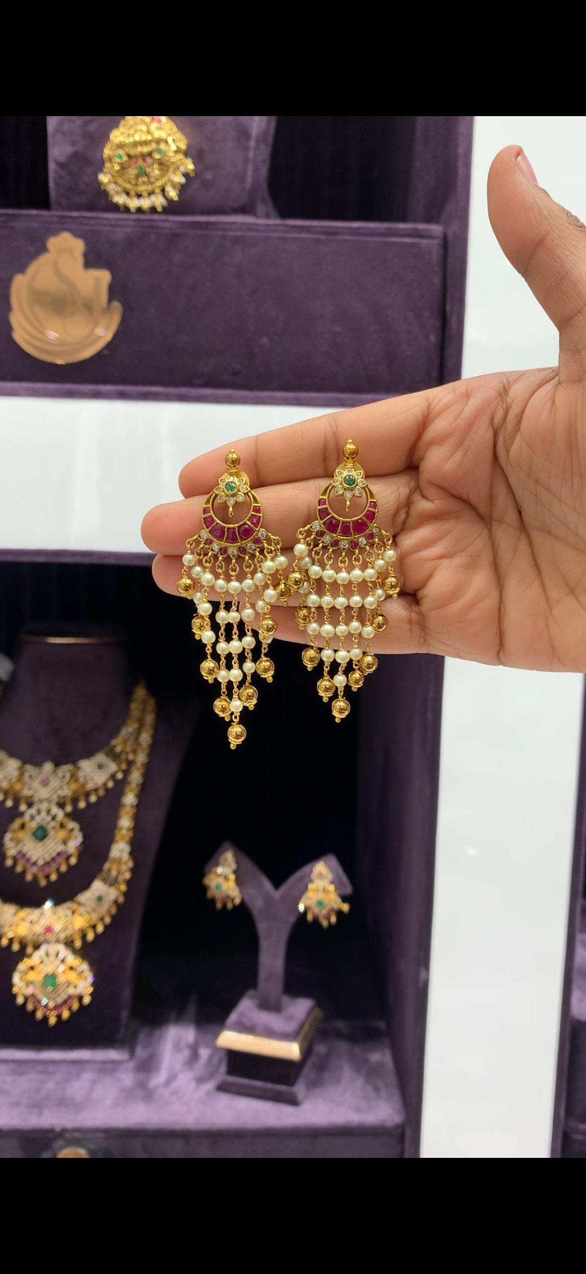 Beautiful Jadav ear hangings with pearls chain