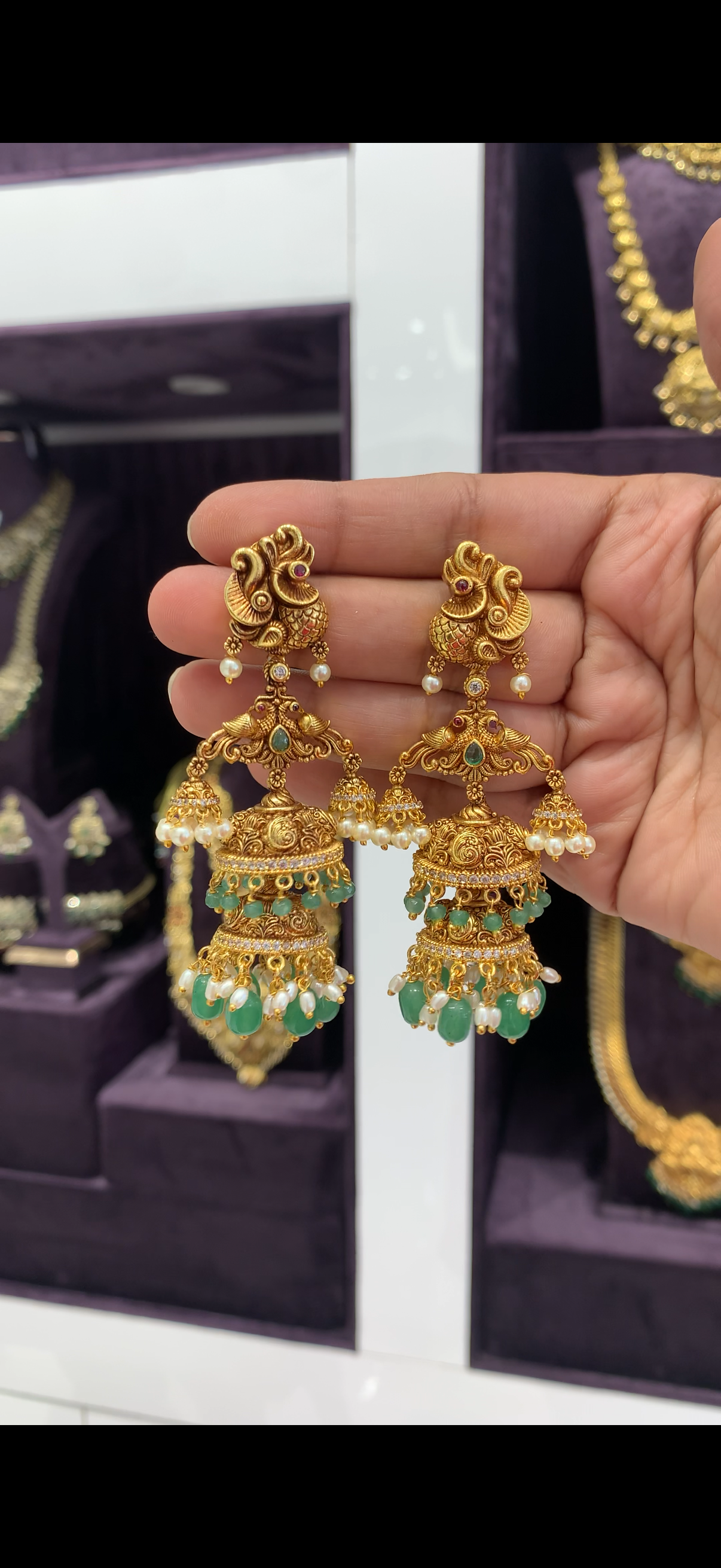 Beautiful peacock design double step pushback jumkis with beads finishing
