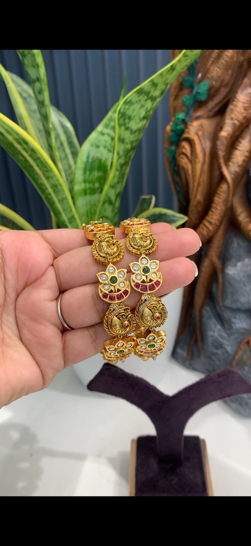 Beautiful peacock design,pota stone bangles