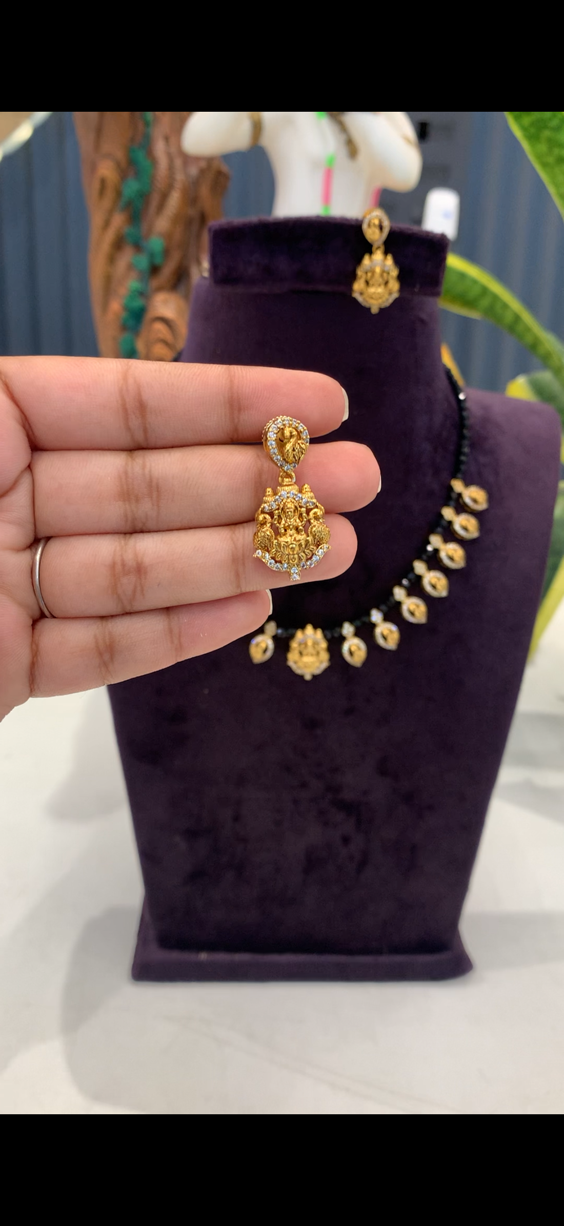 Beautiful black  beads neckset Lakshmi devi and peacock pendants ,with pushback earrings