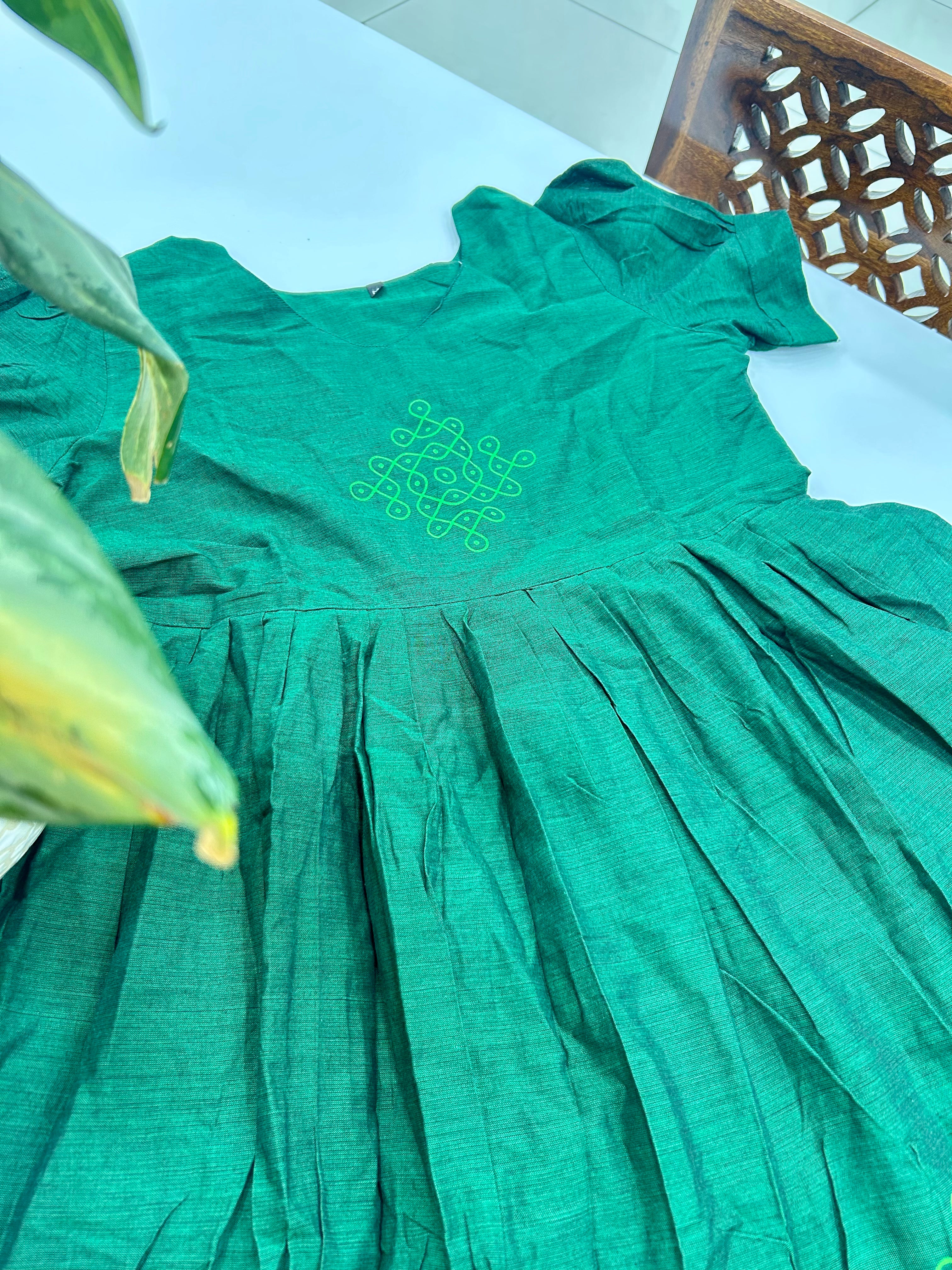 Beautiful muggu design frocks