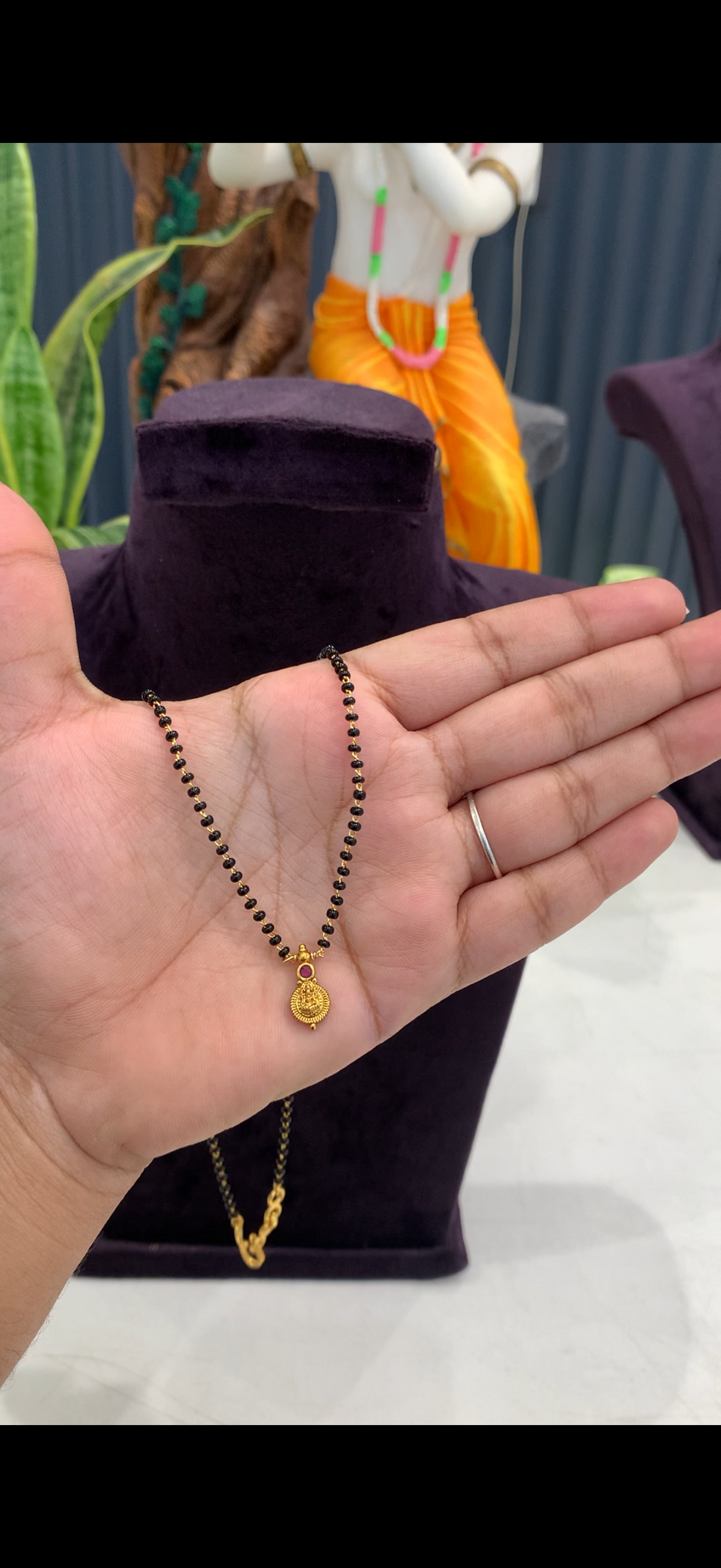 Beautiful cute Lakshmi devi pendant with BlackBeads 18 inchs long