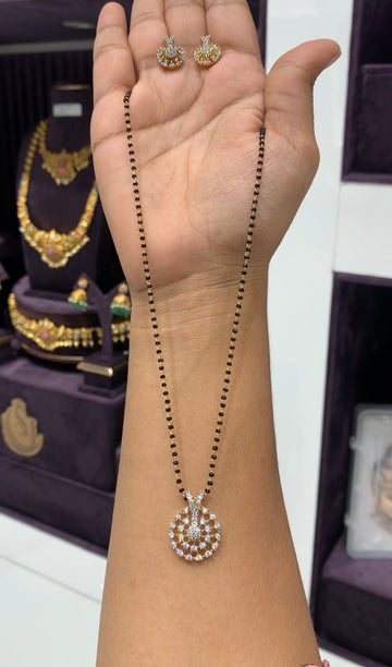 Beautiful white stone pendant with Blackbeads chain 18 inchs long