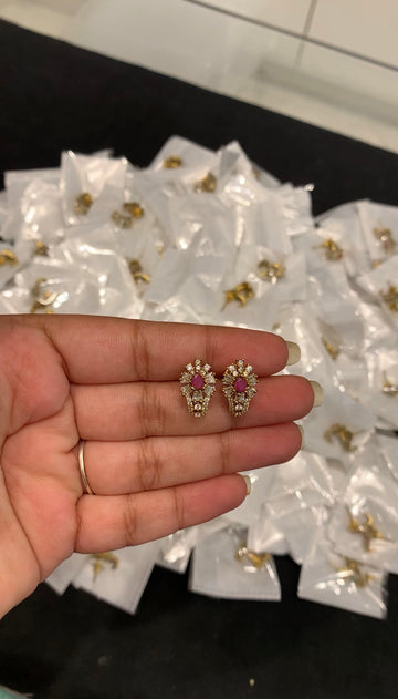 Beautiful pink stone studs with pushback