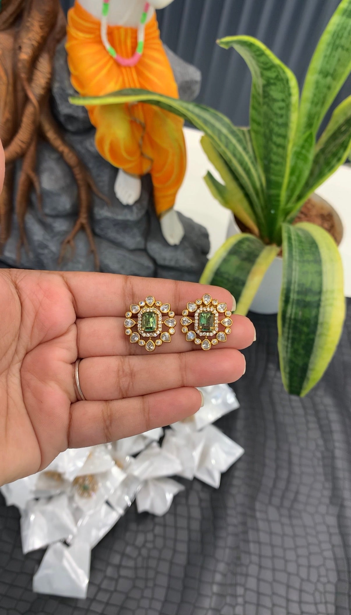 Beautiful green colour stone studs with pushback