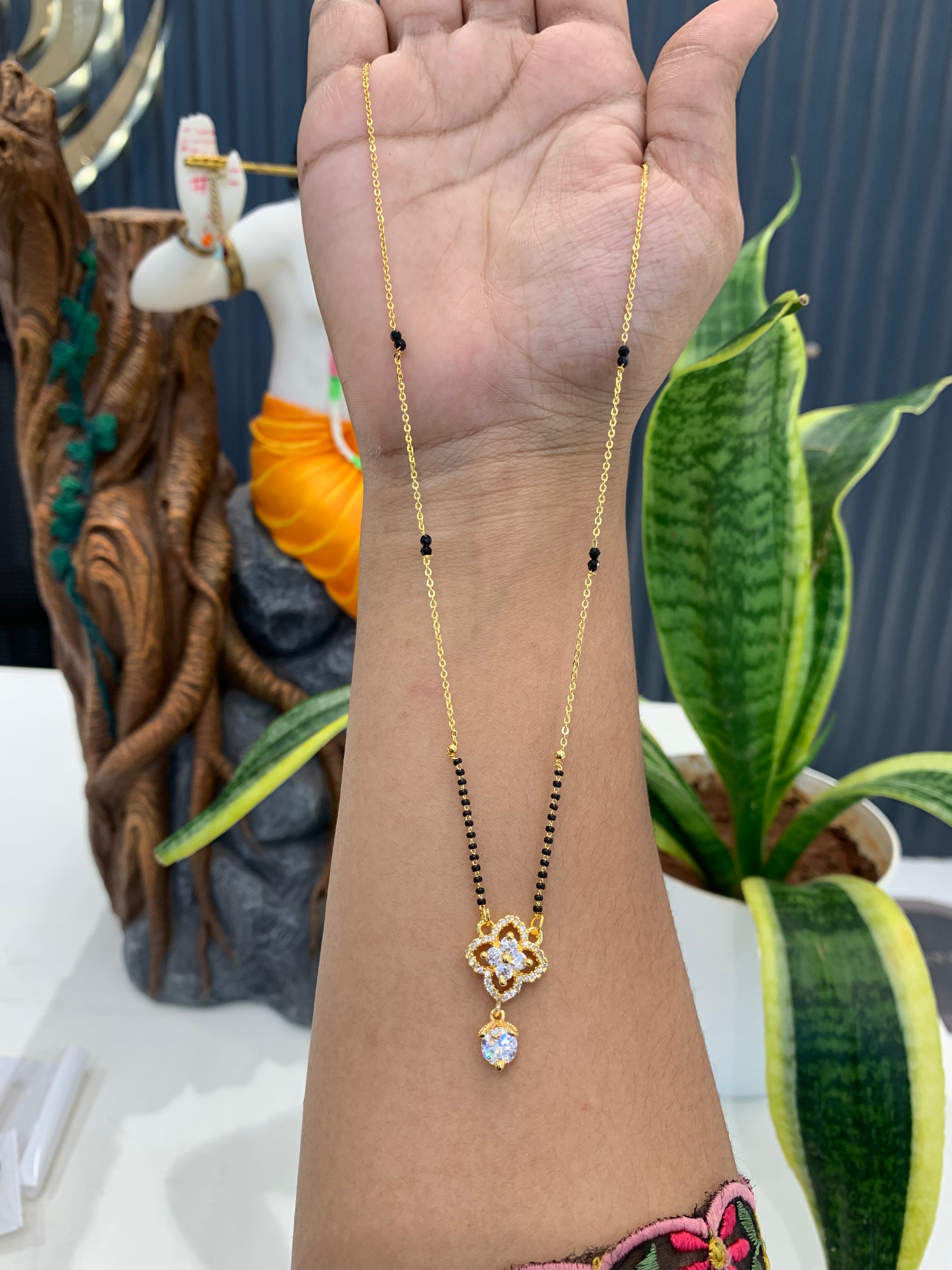 Beautiful simple white stone pendant with Blackbeads chain 18 inchs long