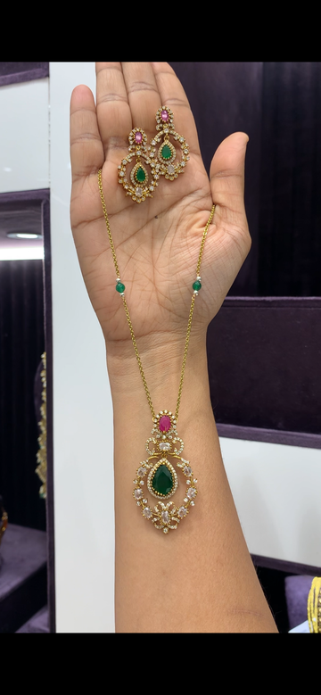 Beautiful multi stone pendant set with Chandraharam chain 18 inchs long