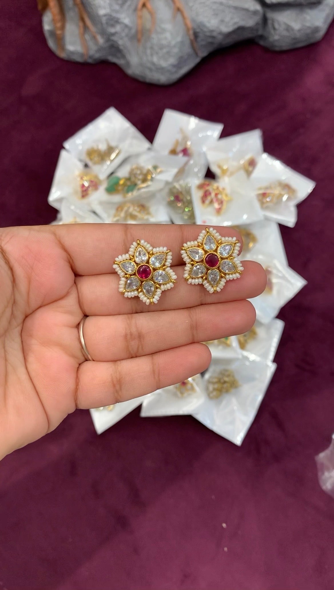Beautiful uncut stone studs with pearls finishing