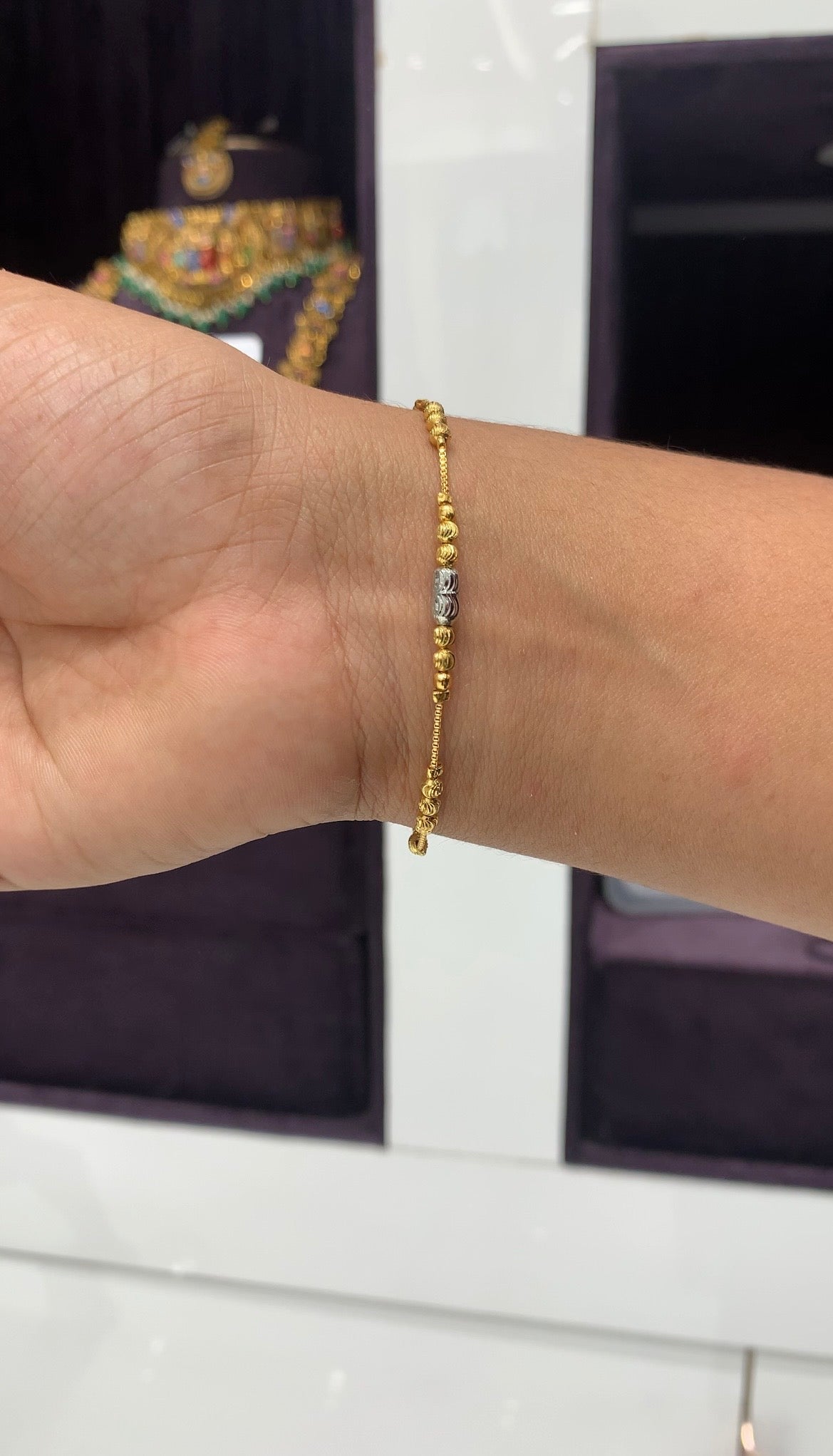 Beautiful gold & silver balls bracelet with adjustable rings