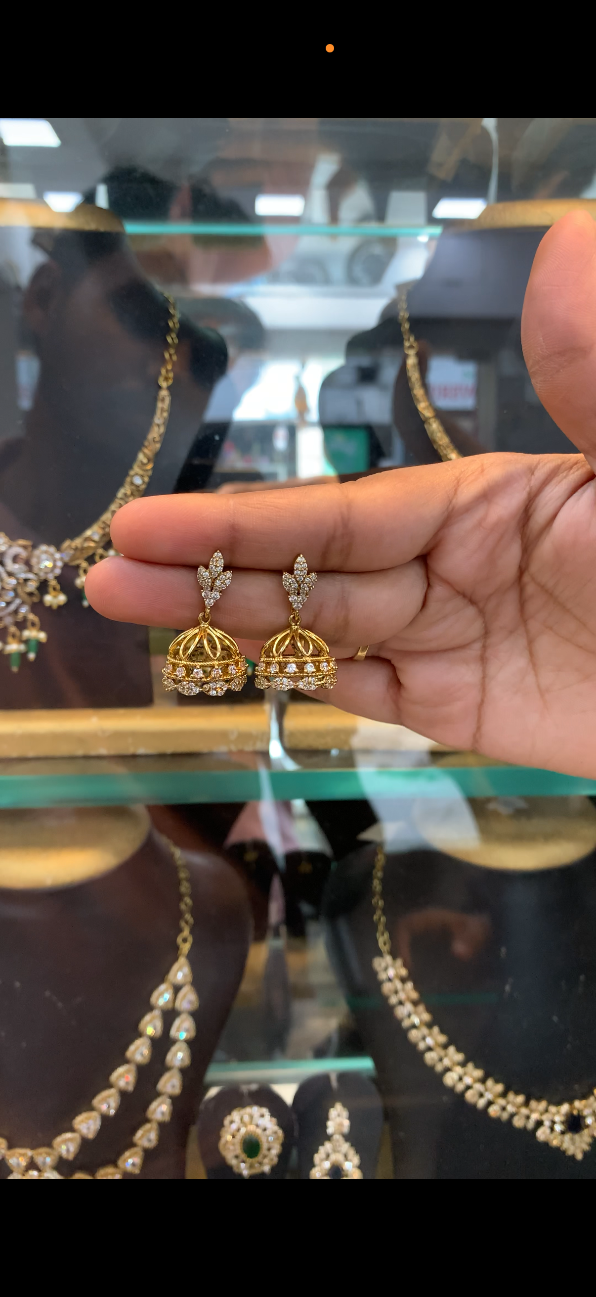 Cute jhumkis with victoria polish