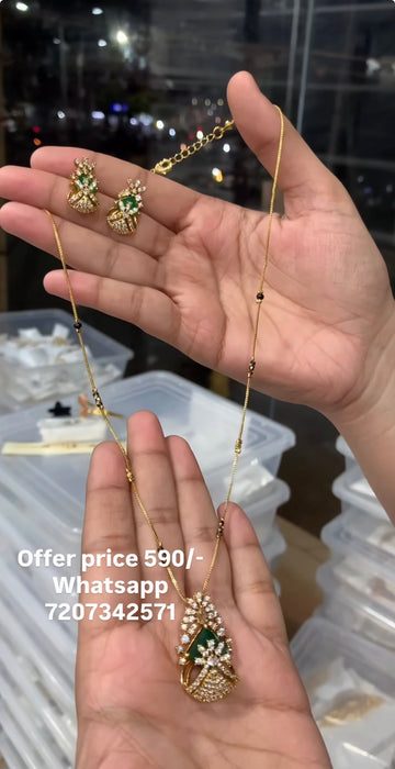 Beautiful green stone pendant set with blackbeads chain 18 inchs long