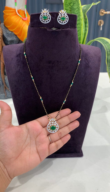 Beautiful green stone pendant set with handmaking black beads chain 18 inchs long