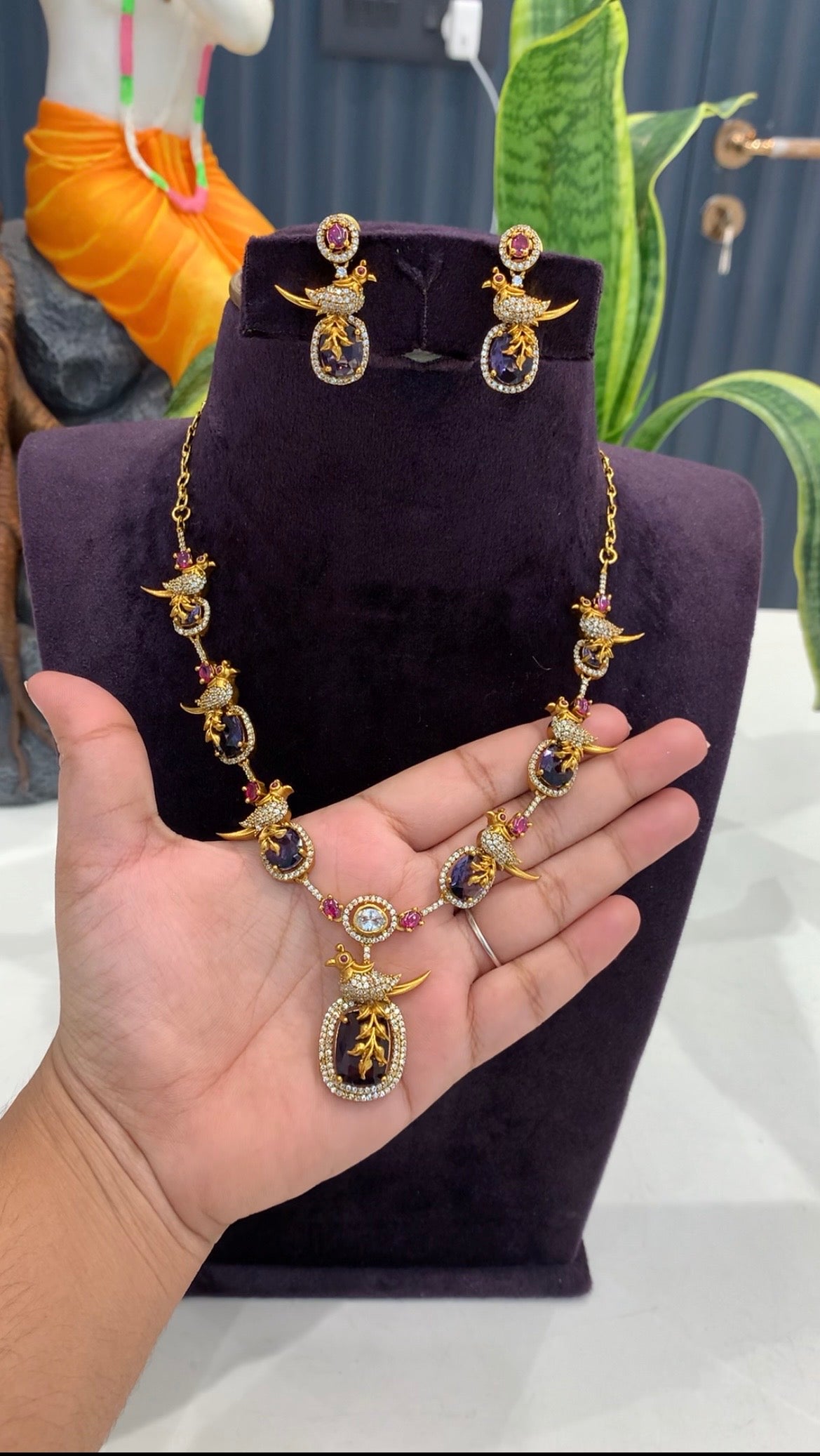 Beautiful purple stones parrot design necklace set with pushback earrings