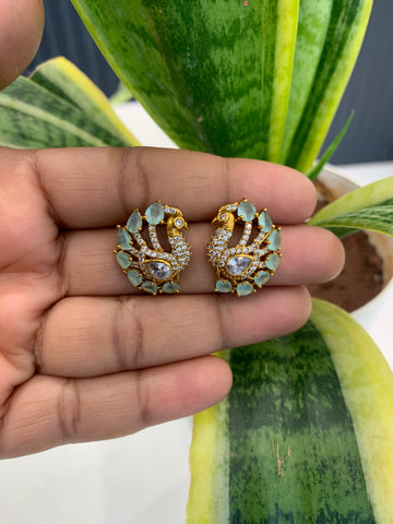 Beautiful peacock design green & white stone studs with pushback