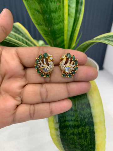 Beautiful peacock design green & white stone studs with pushback