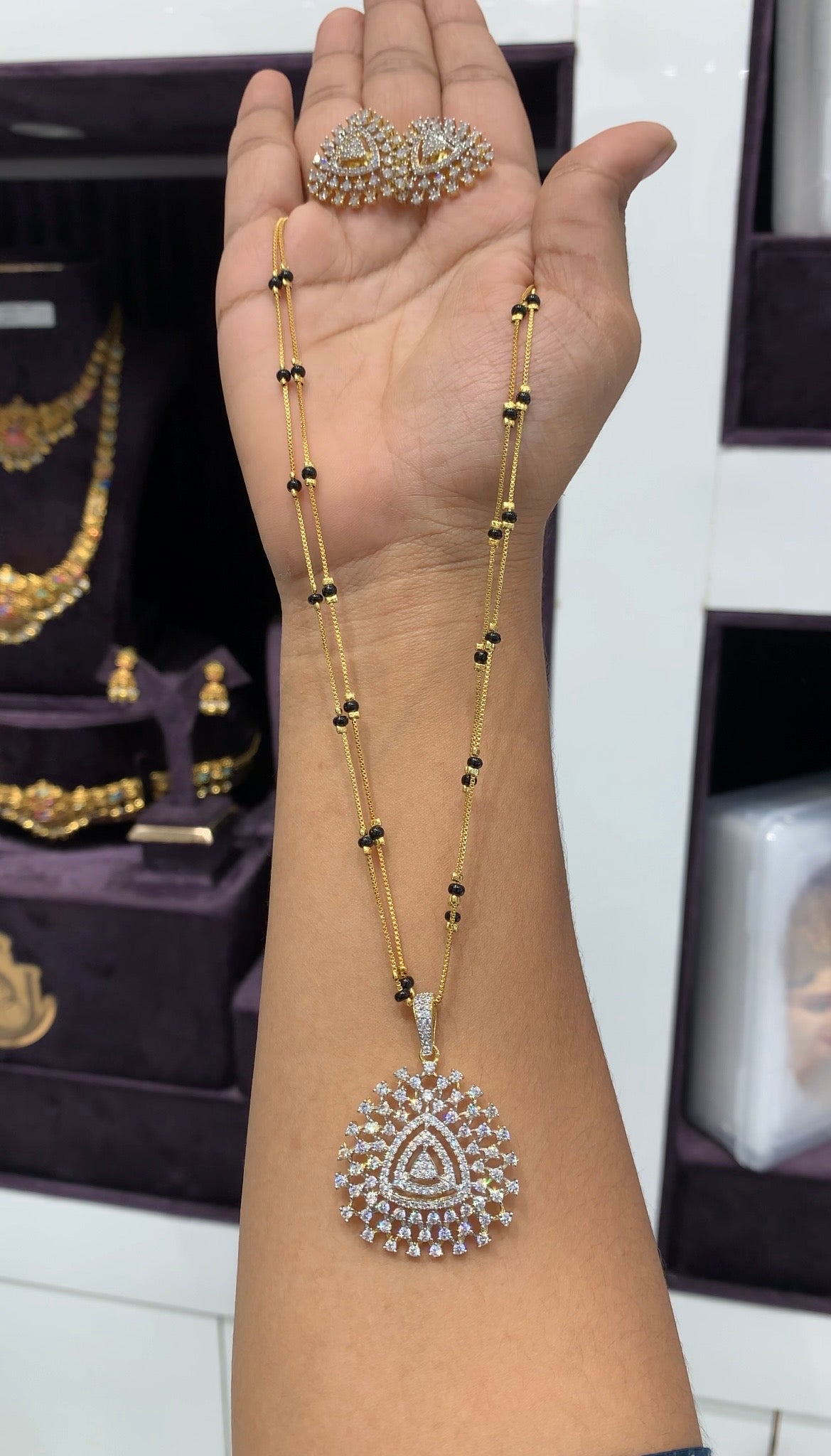 Beautiful Diamond Replica pendant set with black beads 2layers chain 18 inchs long