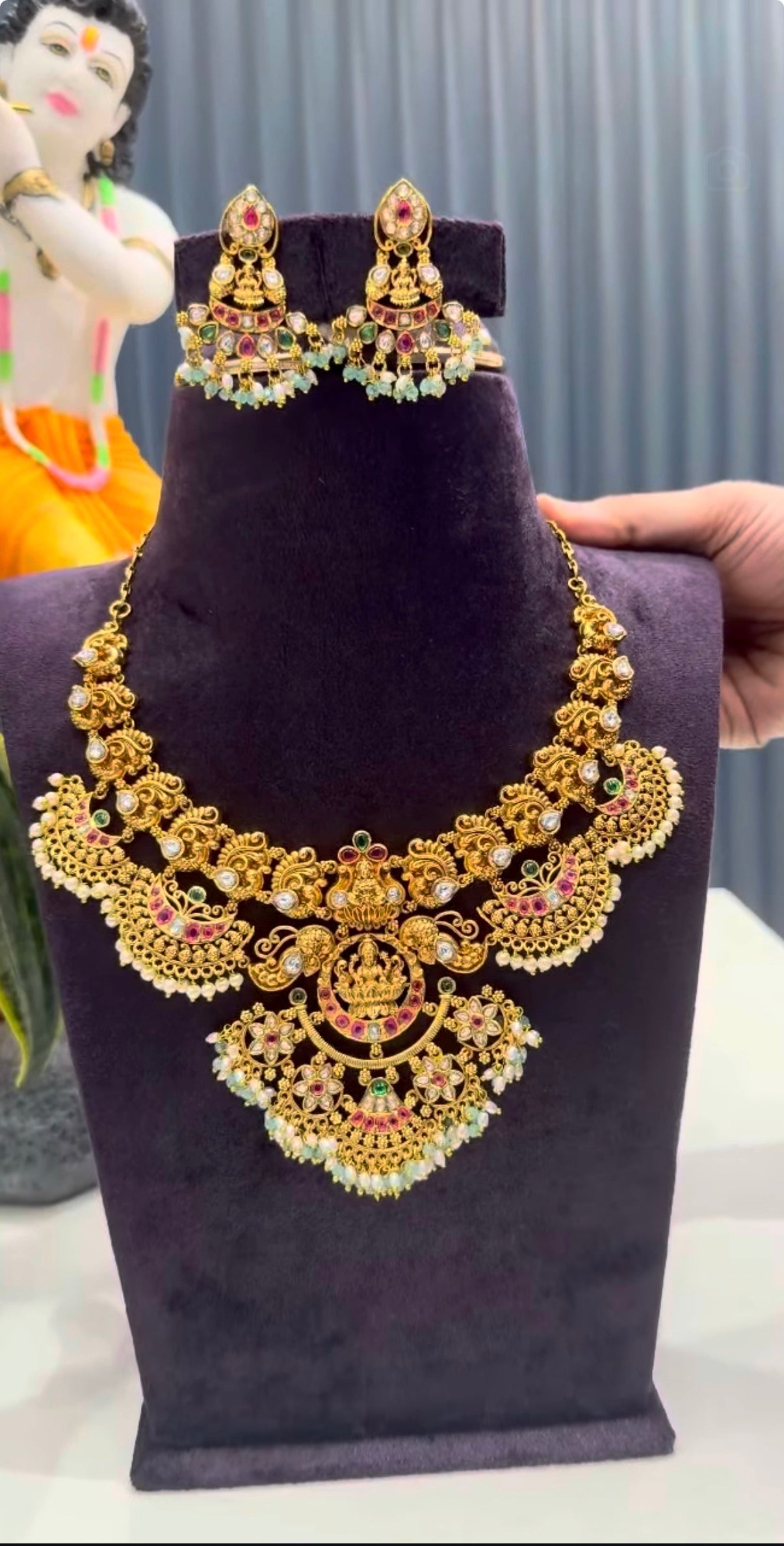 Beautiful Lakshmi devi pearls finishing necklace with screwback earrings
