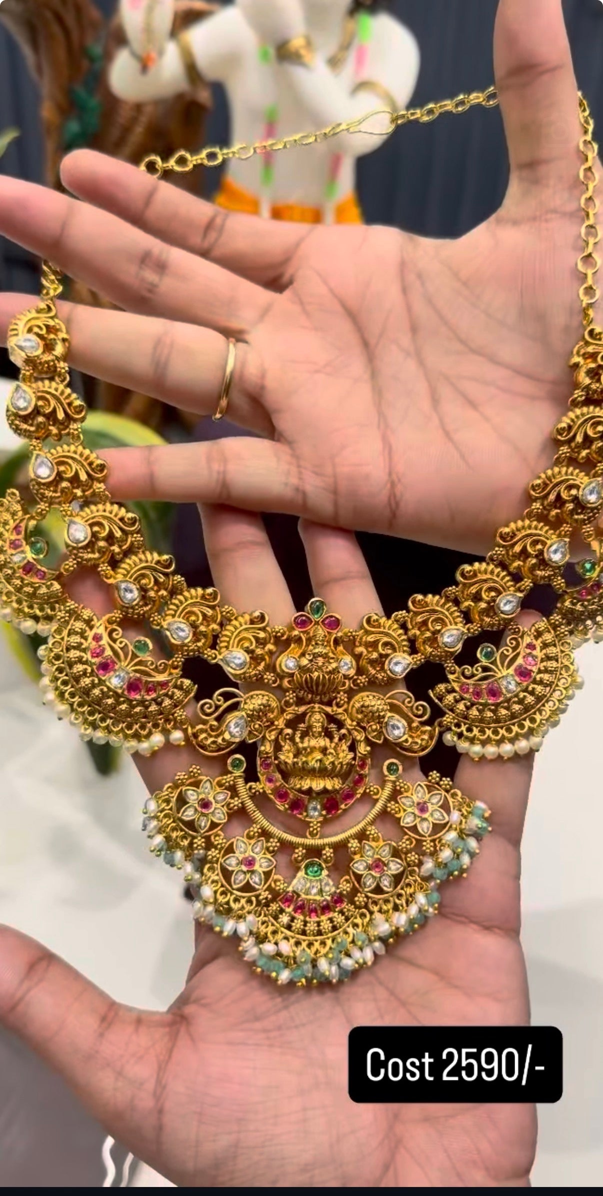 Beautiful Lakshmi devi pearls finishing necklace with screwback earrings