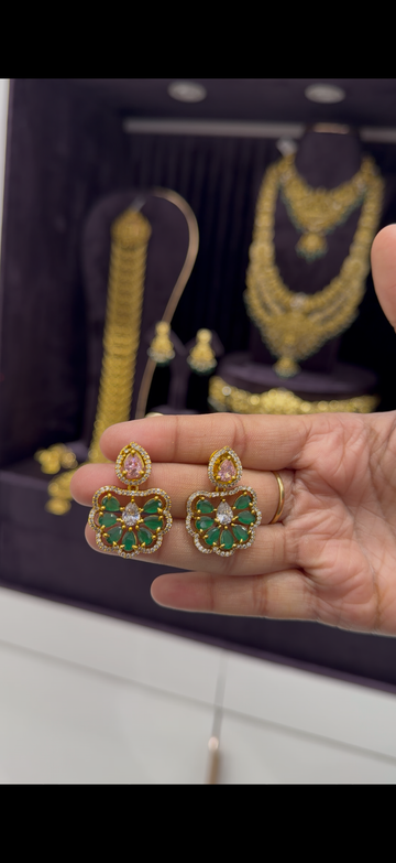 Cute earrings with green and pink stone and with pushback