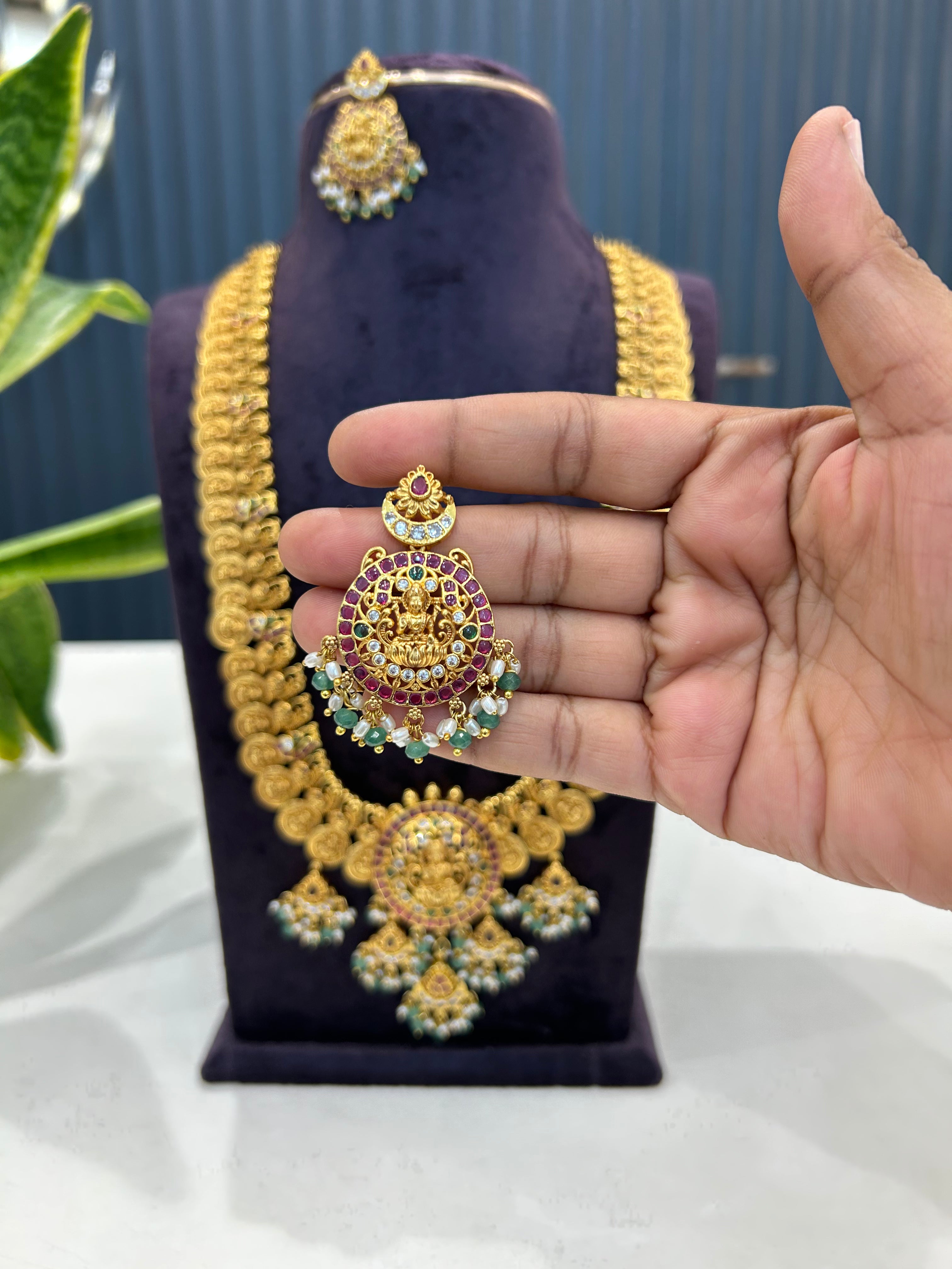 Beautiful pota stone & Lakshmi devi kasula model long haram with screwback earrings