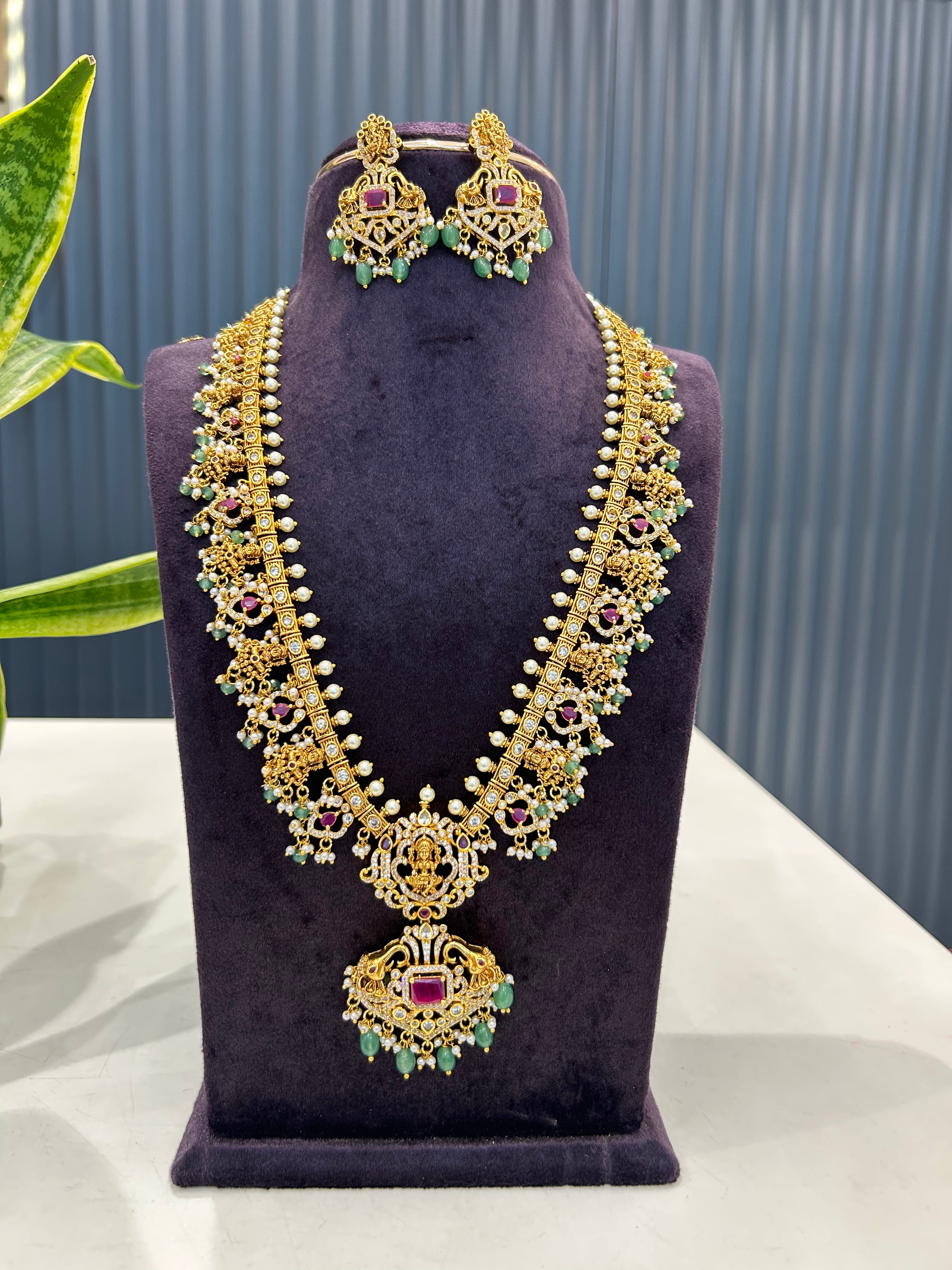 Beautiful CZ stones & Lakshmi devi model gutta pusalu long haram with screwback earrings