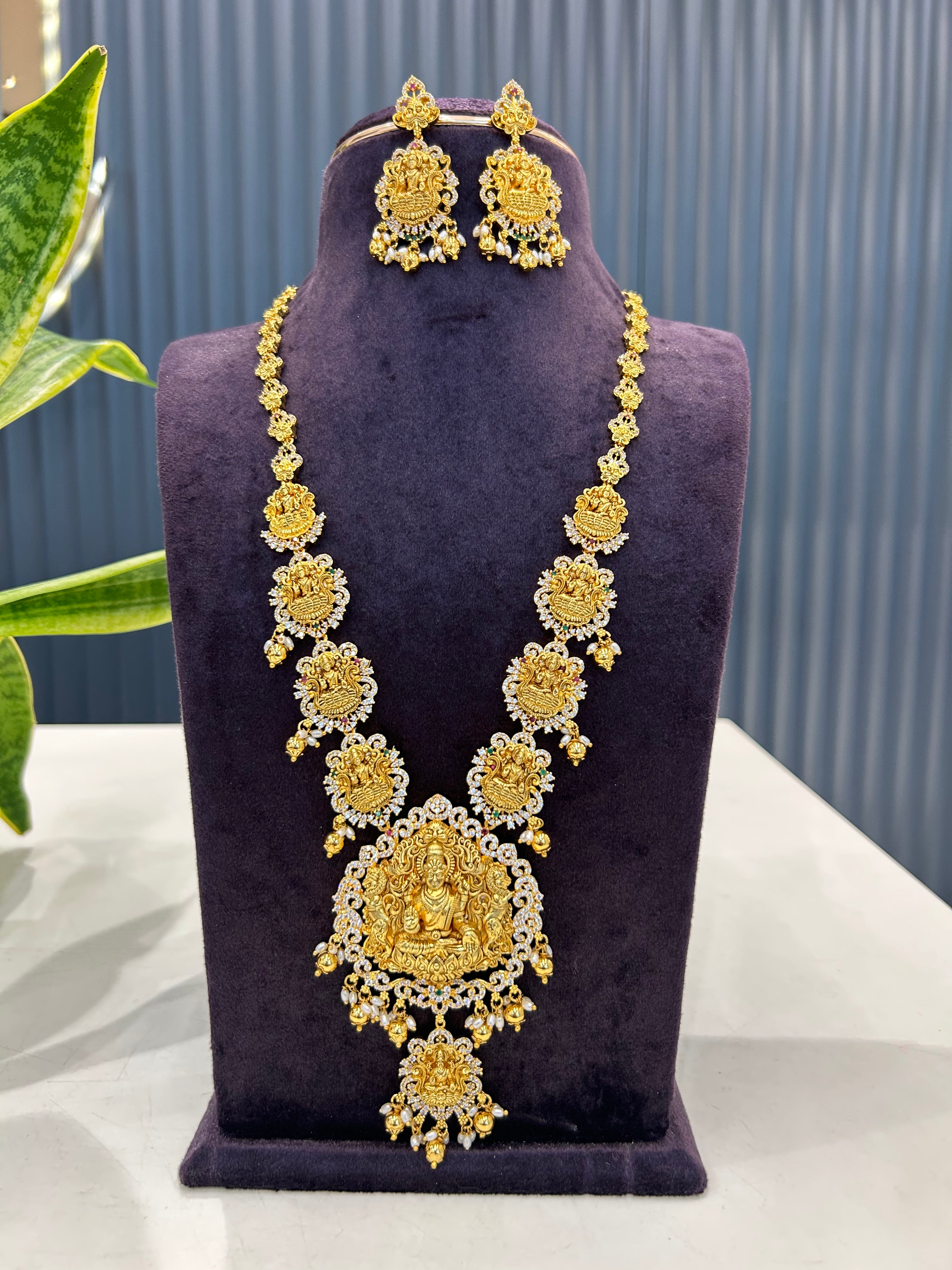 Beautiful CZ stones & Lakshmi devi model long haram with pushback earrings