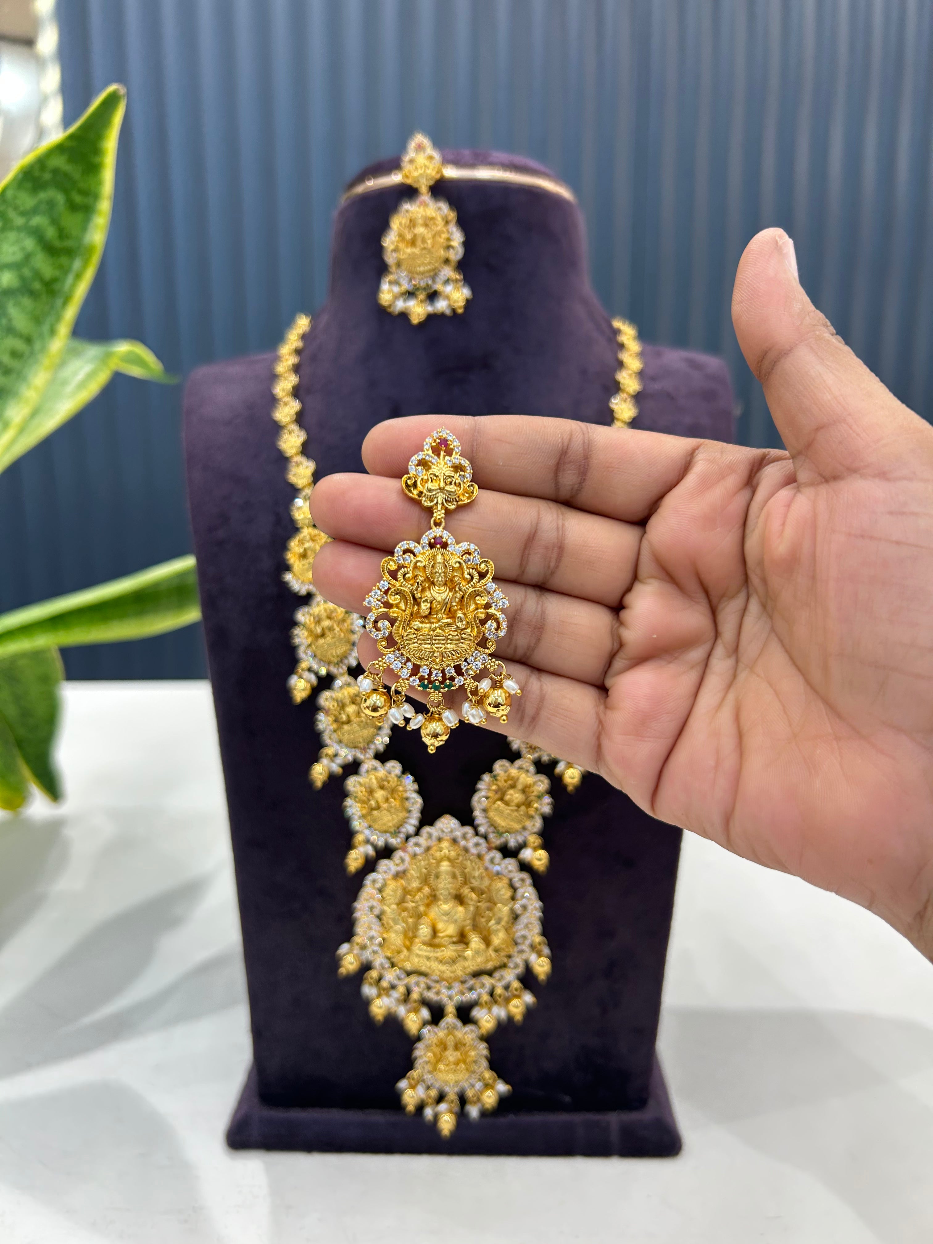 Beautiful CZ stones & Lakshmi devi model long haram with pushback earrings