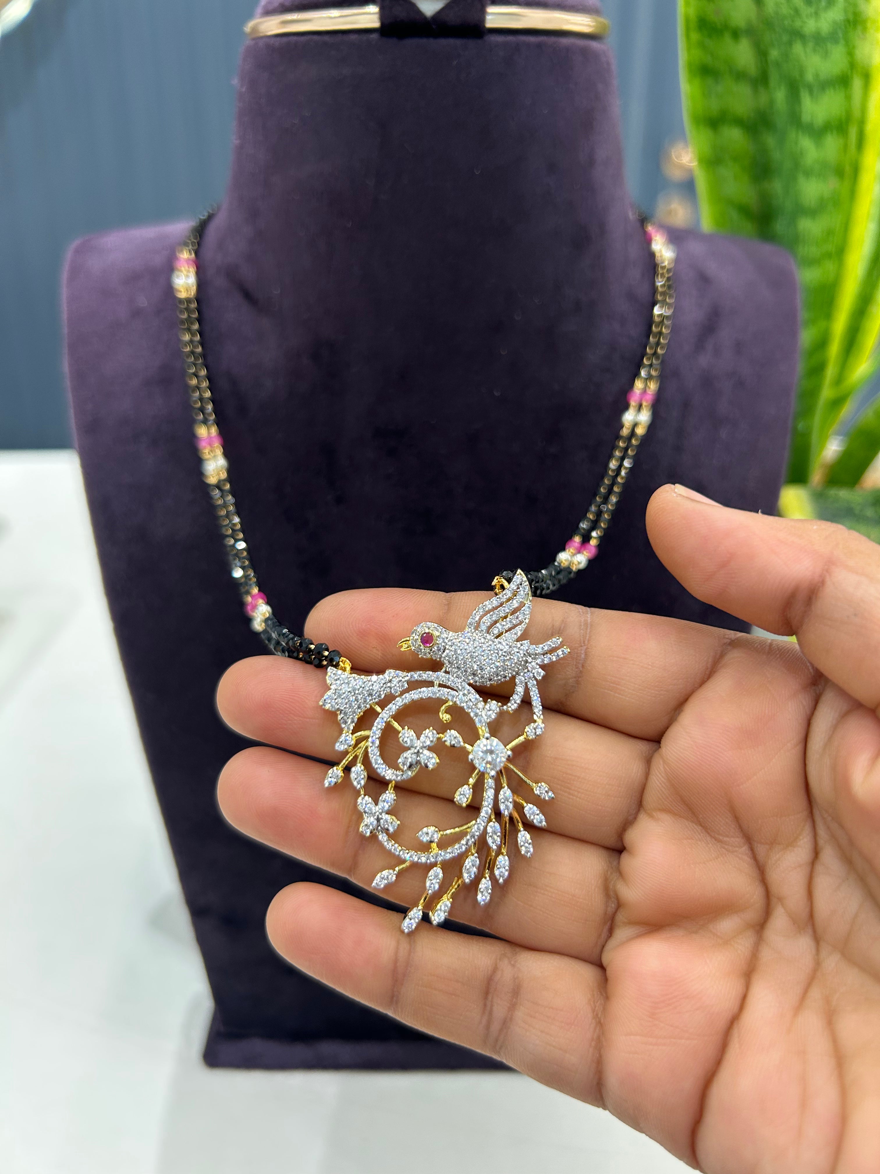 Beautiful white stone pendant 2layers Blackbeads chain 18 inchs long