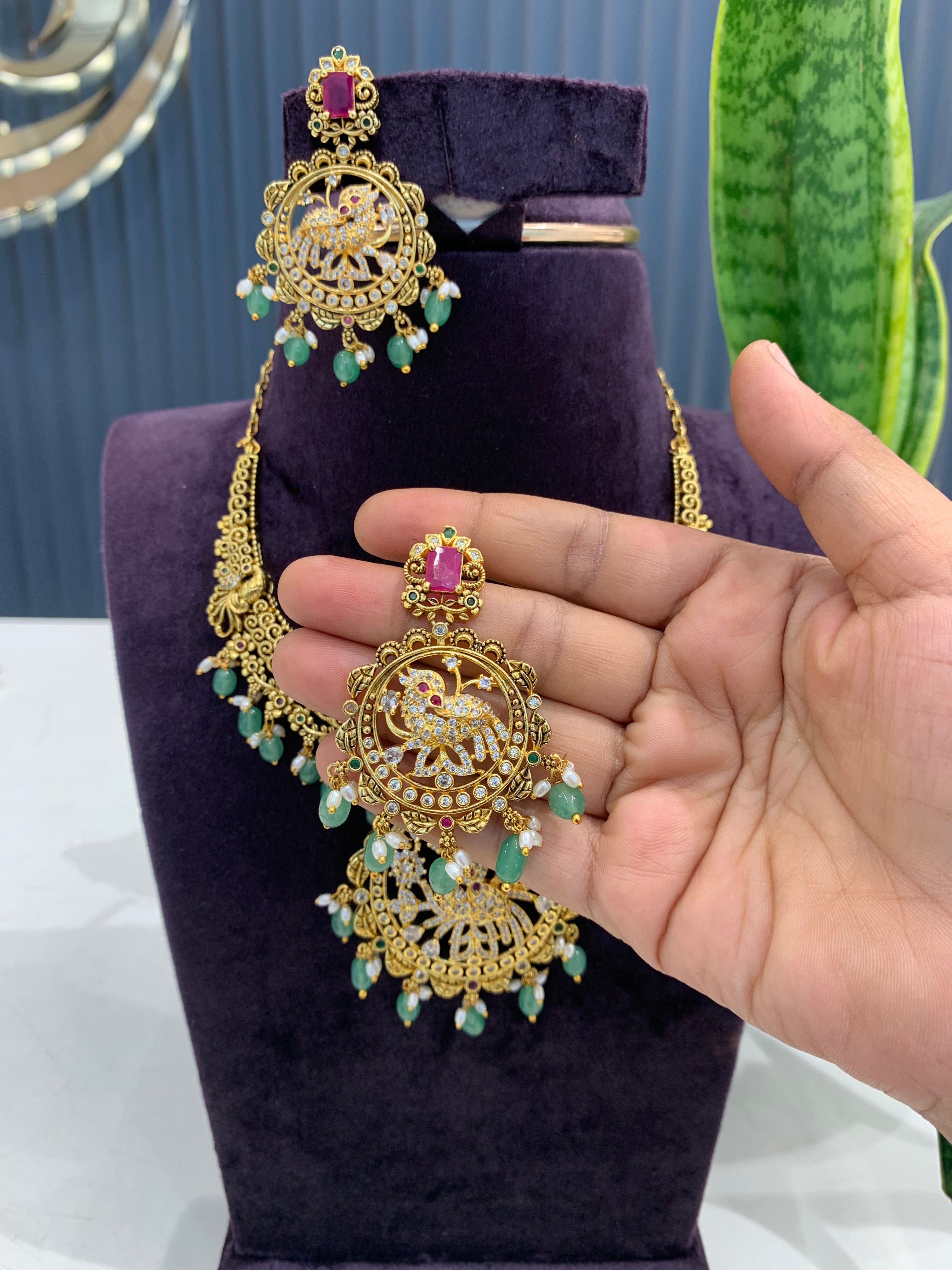 Beautiful peacock design beads finishing necklace with screwback earrings