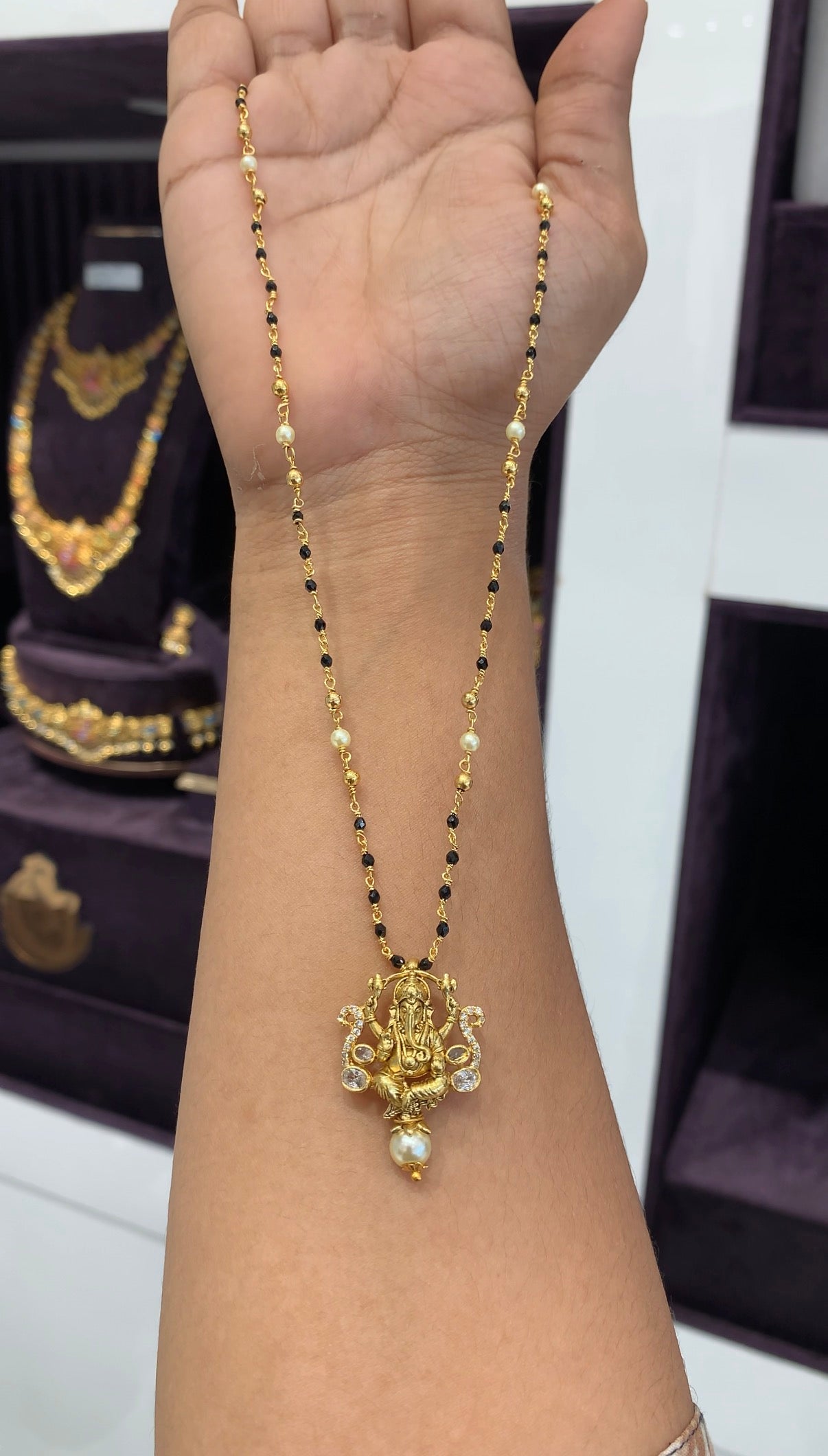 Beautiful Ganesh pendant with handmaking black beads chain 18 inchs long