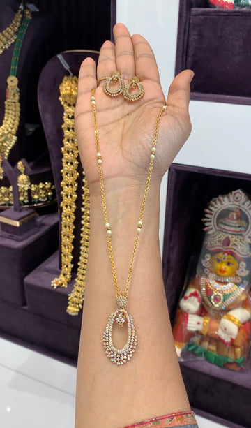 Beautiful white stone pendant set with handmaking pearls ,Chandraharam chain 18 inchs long