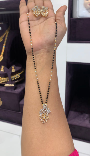 Beautiful white stone pendant set with Blackbeads chain 18 inchs long
