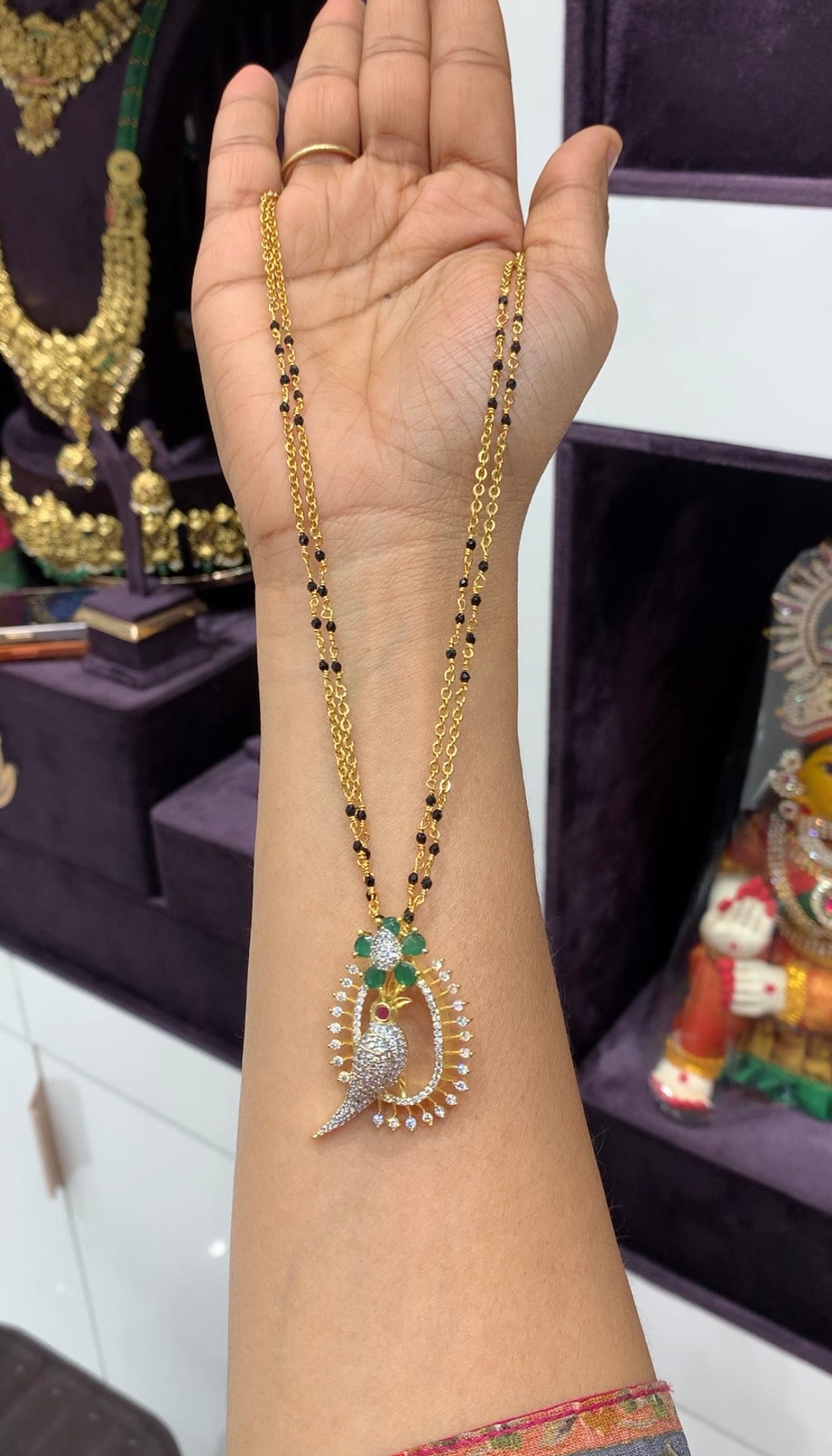 Beautiful parrot design pendant with handmaking blackbeads &Chandraharam chain 18 inchs long