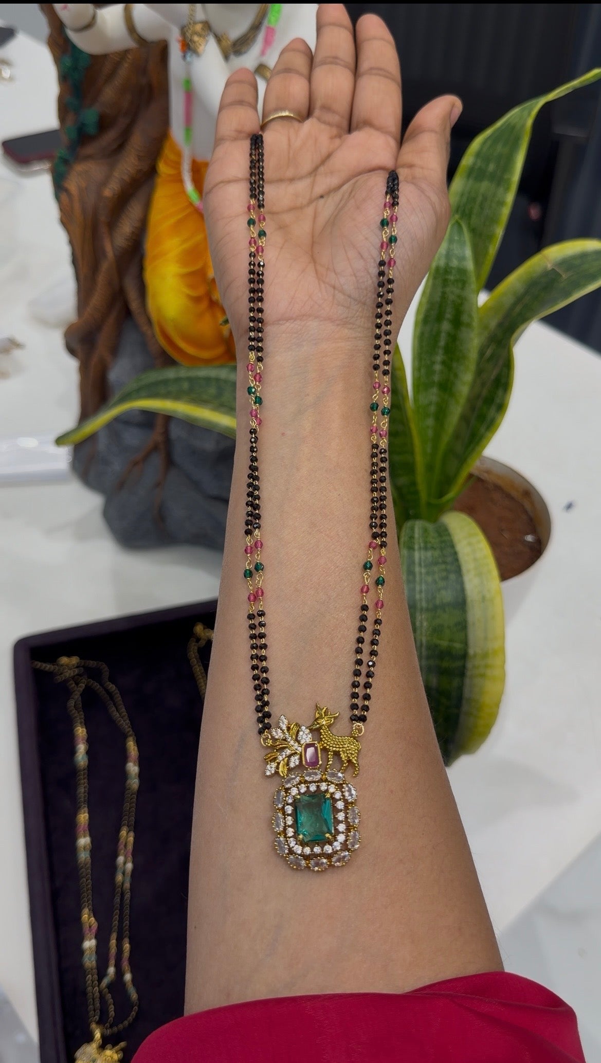 Beautiful green stone pendant with Blackbeads chain 24 inchs long