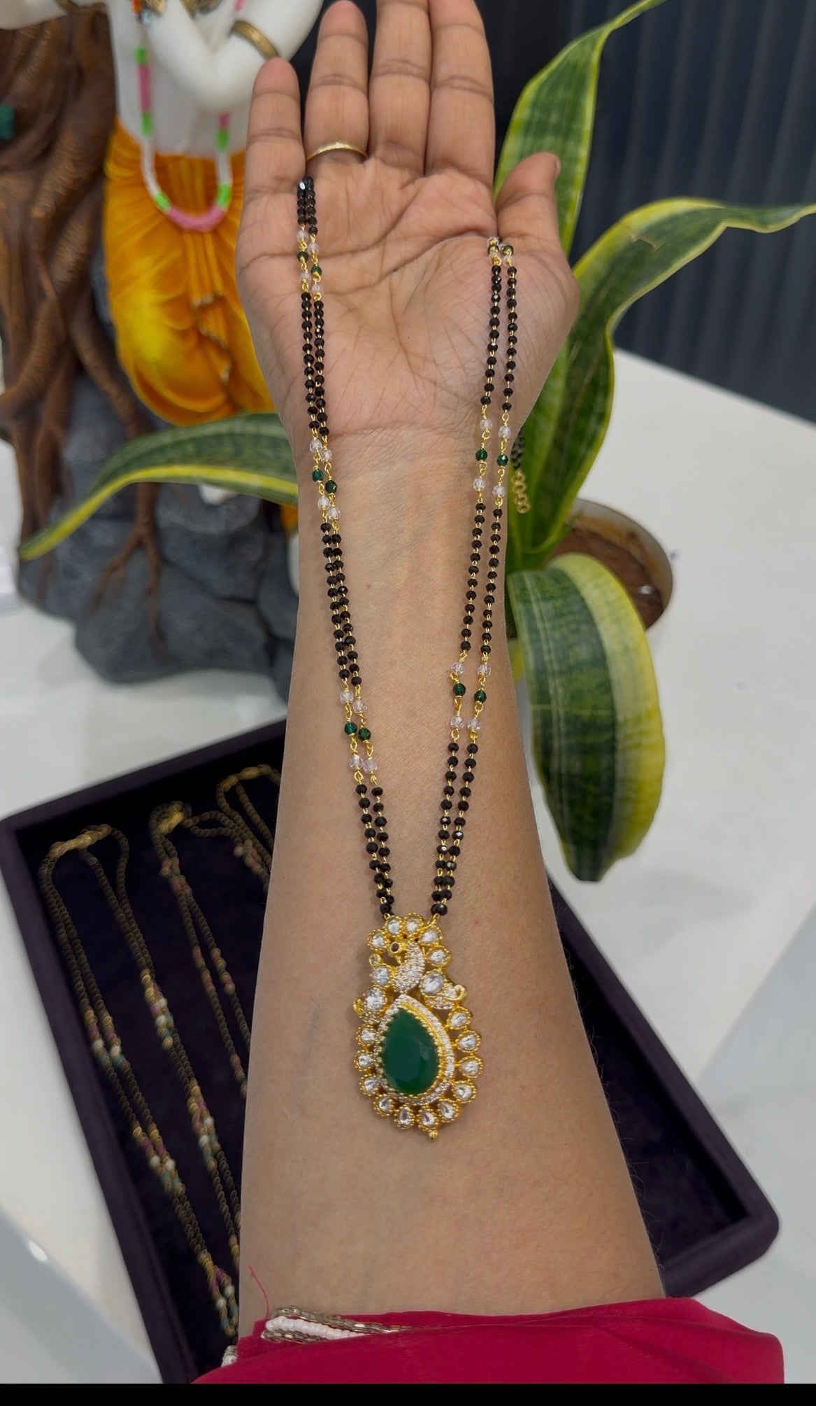 Beautiful uncut stones peacock pendant with Blackbeads chain 24 inchs long