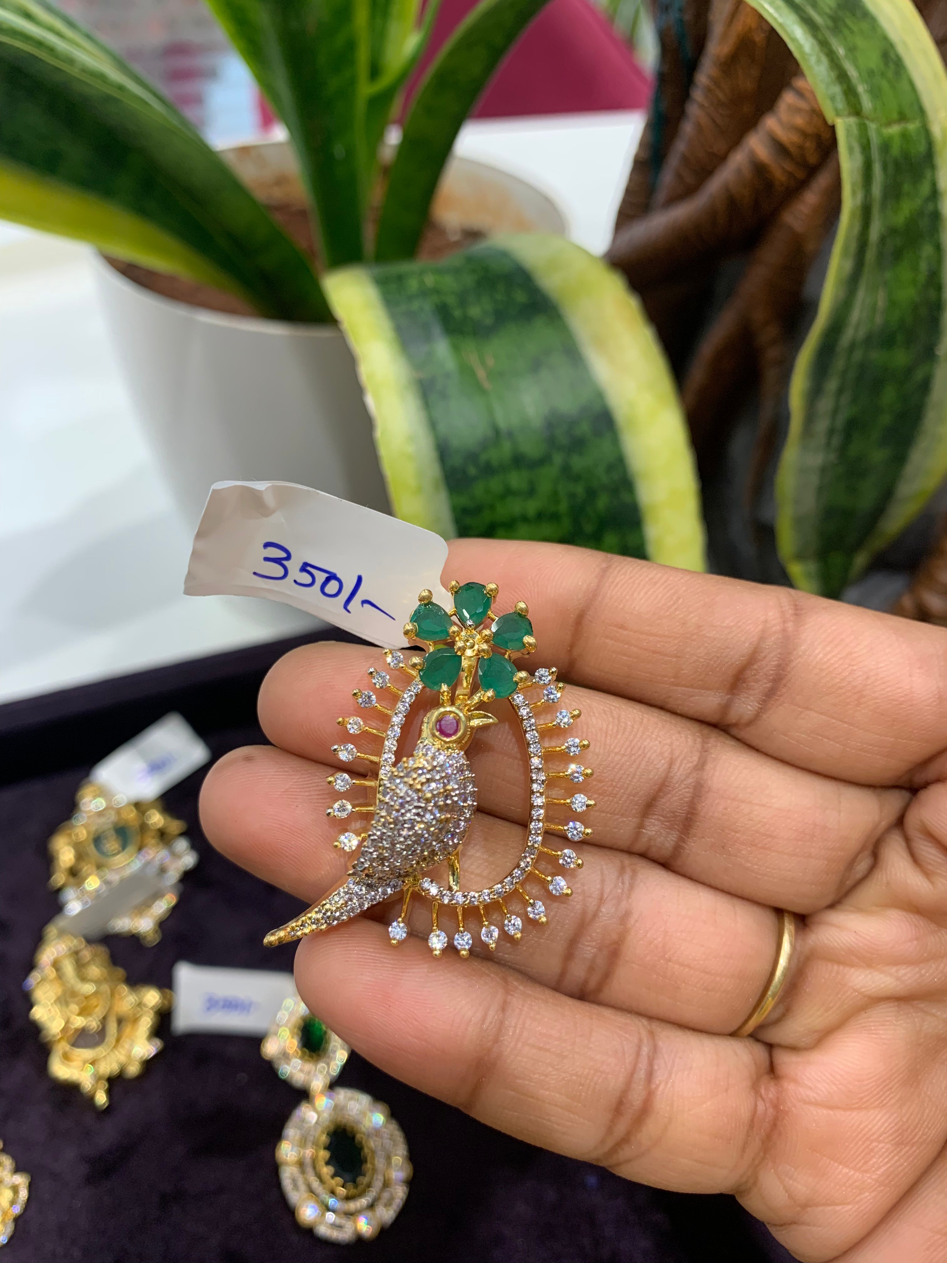 Beautiful CZ stones parrot design pendant with back hook