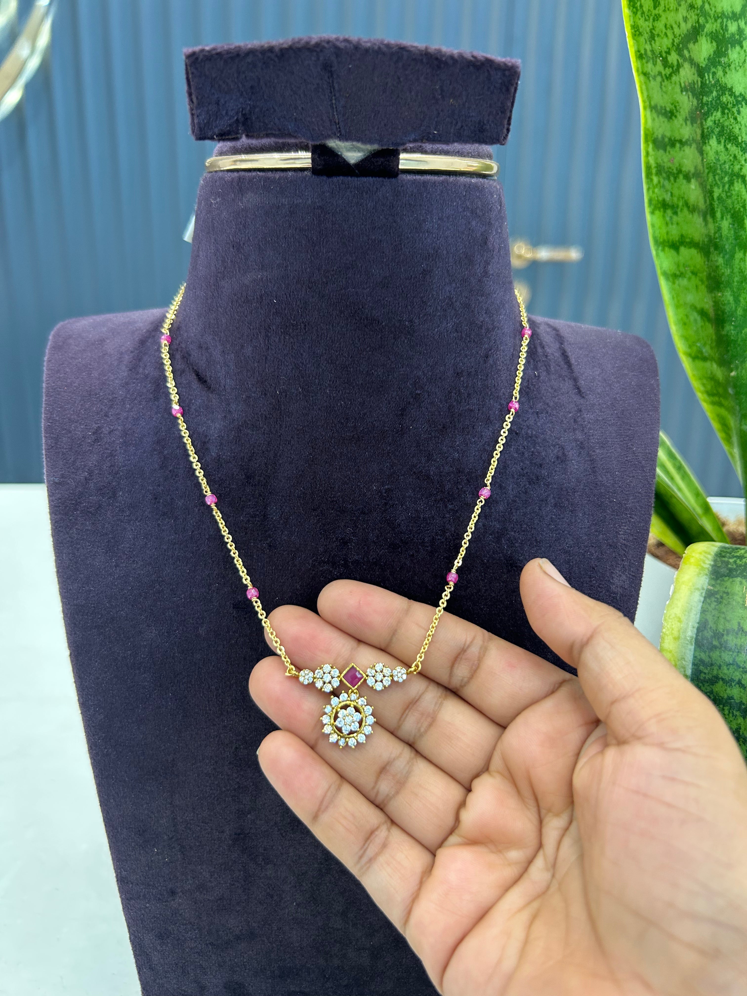 Beautiful white stone pendant with Chandraharam chain 18 inchs long
