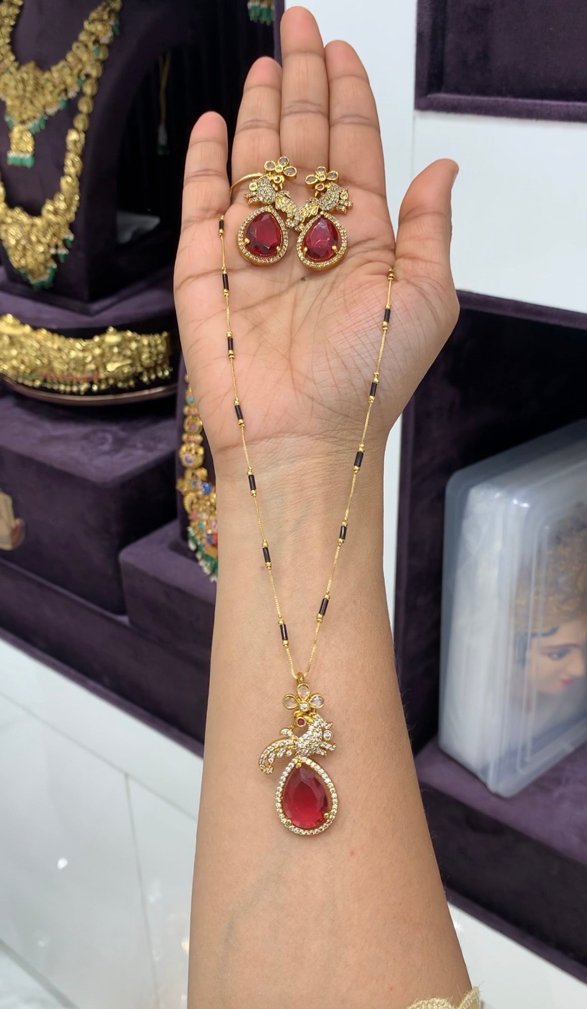Beautiful red colour pendant set with Blackbeads chain 18 inchs long