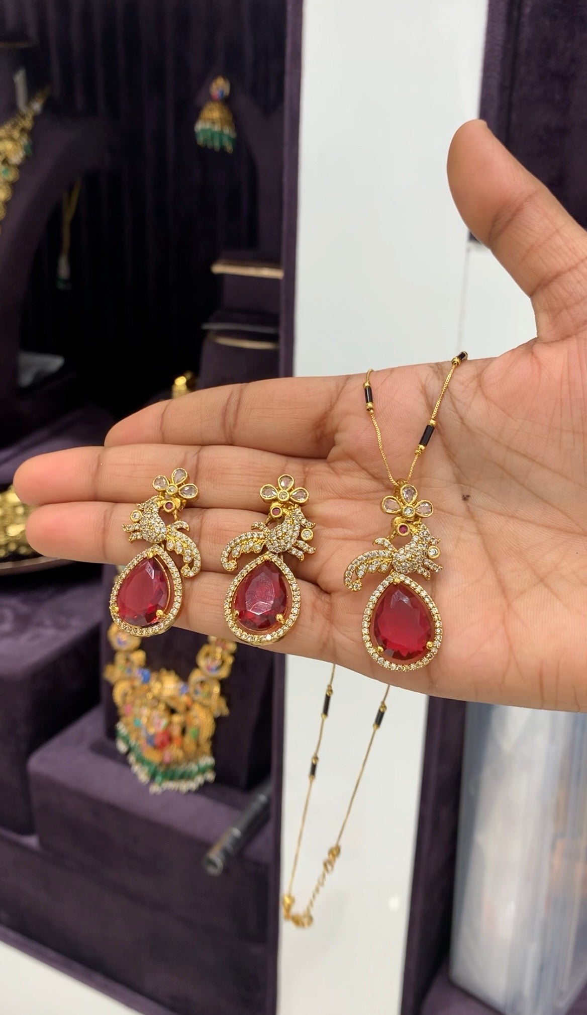 Beautiful red colour pendant set with Blackbeads chain 18 inchs long