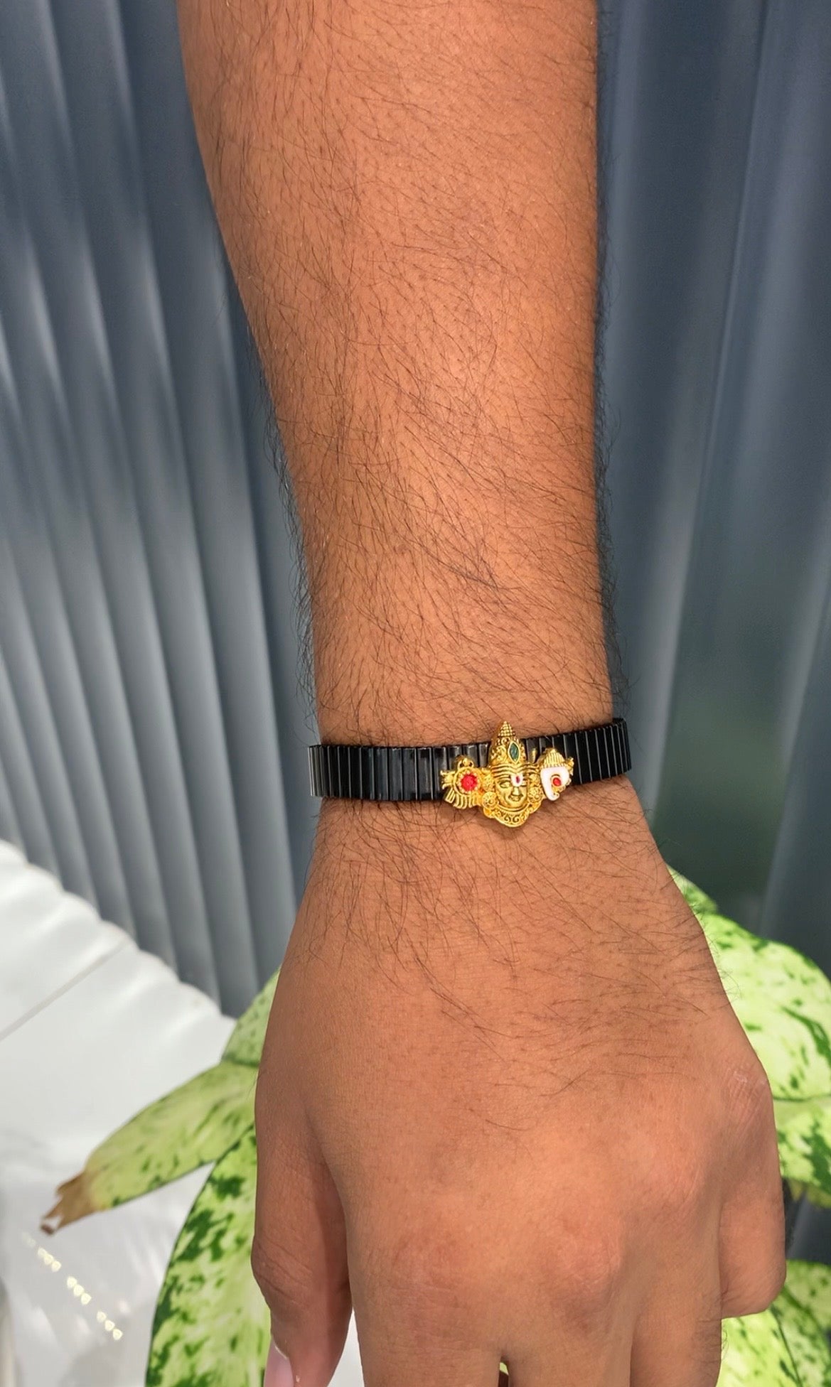 Beautiful adjustable Balaji idol bracelet/rakhi