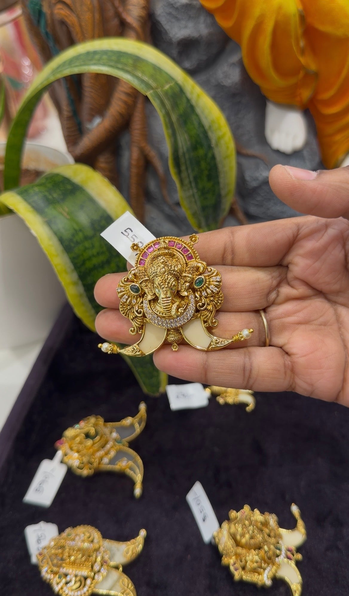 Beautiful ganesh pendant tiger nail with backhook