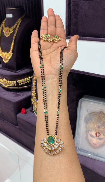 Beautiful green stone pendant set with Blackbeads chain 18 inchs long