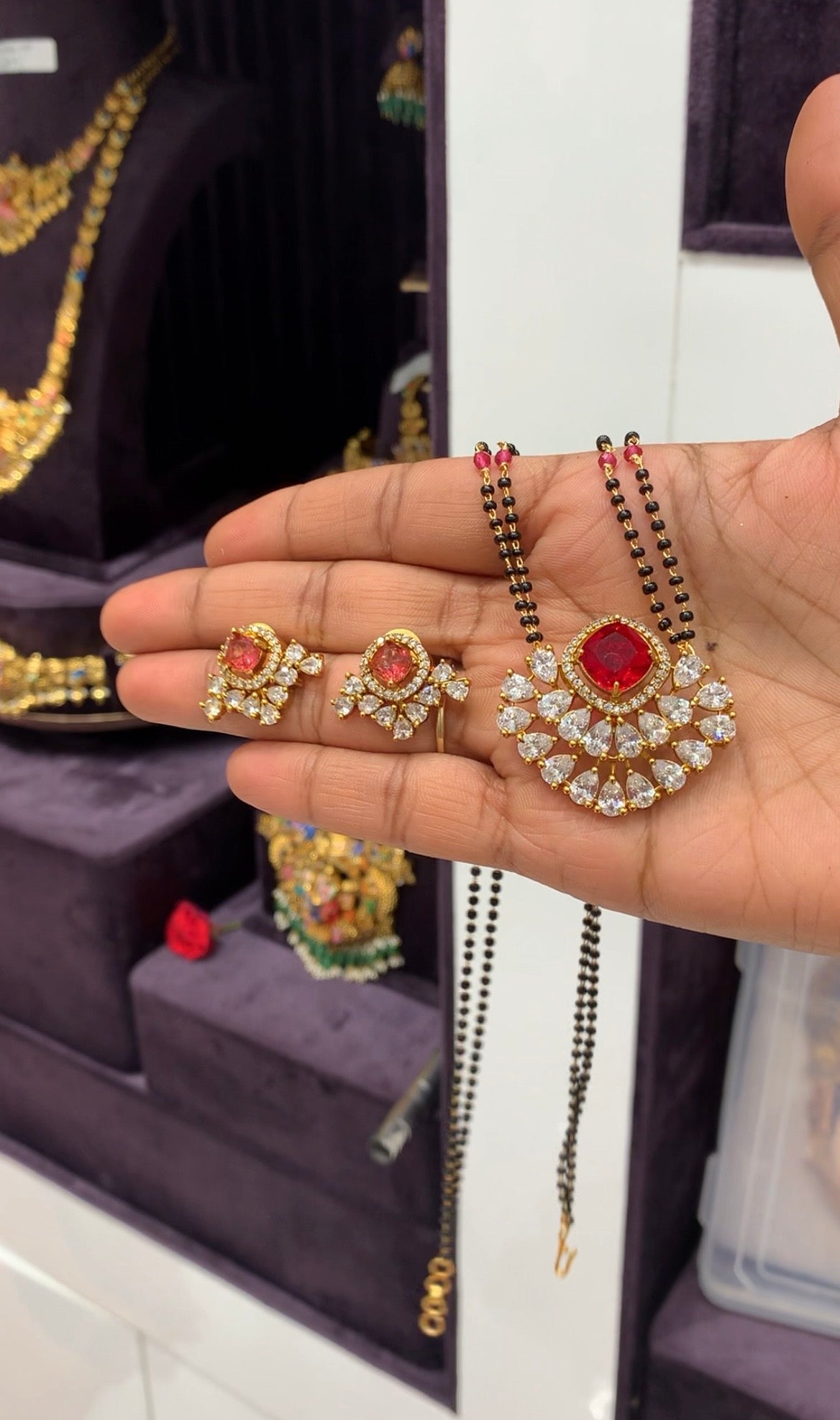 Beautiful red color stone pendant set with Blackbeads chain 18 inchs long