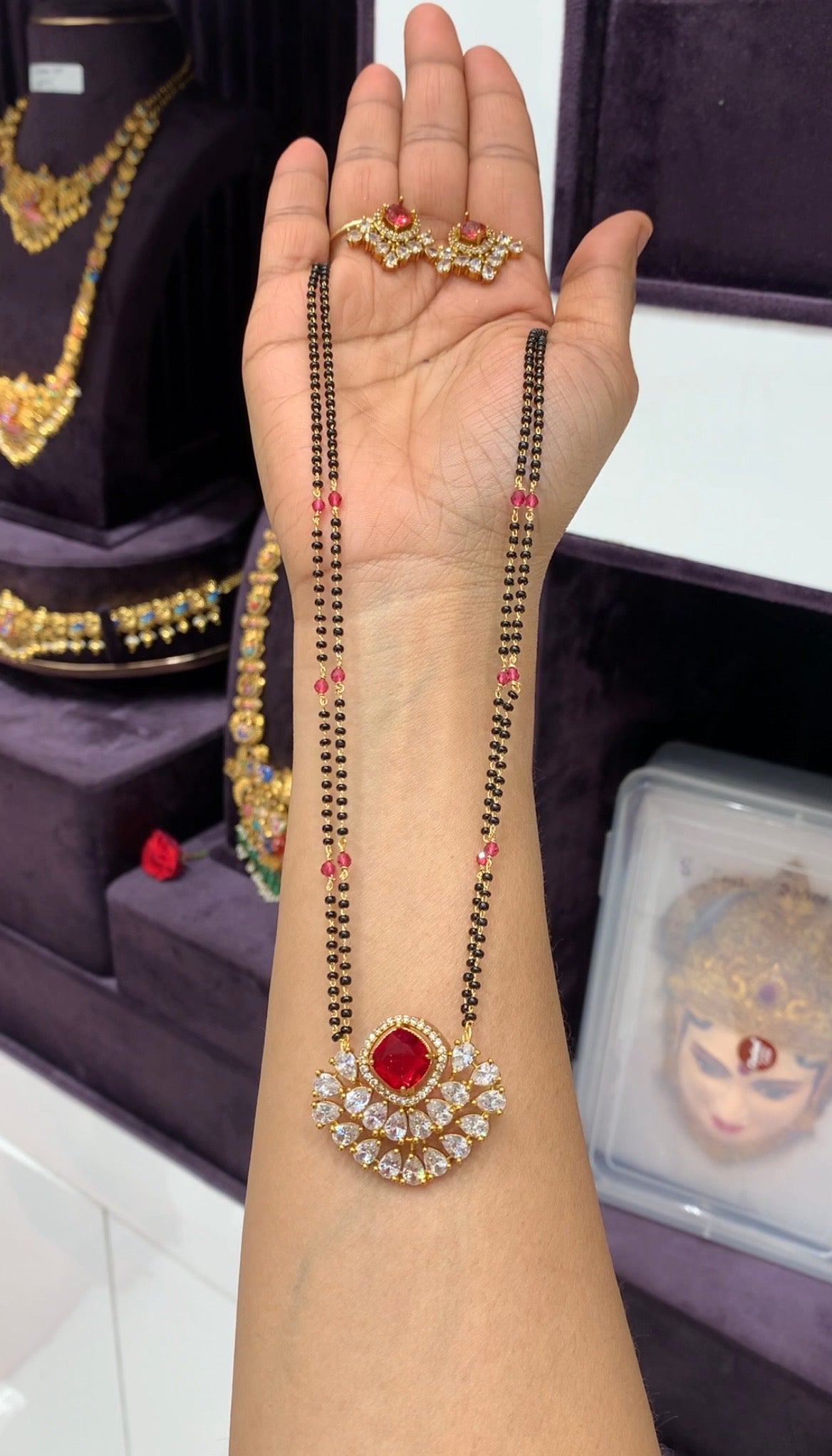 Beautiful red color stone pendant set with Blackbeads chain 18 inchs long