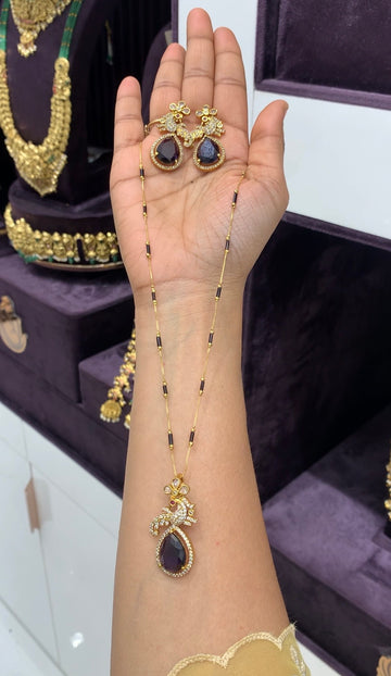 Beautiful purple color pendant set with black beads chain 18 inchs long