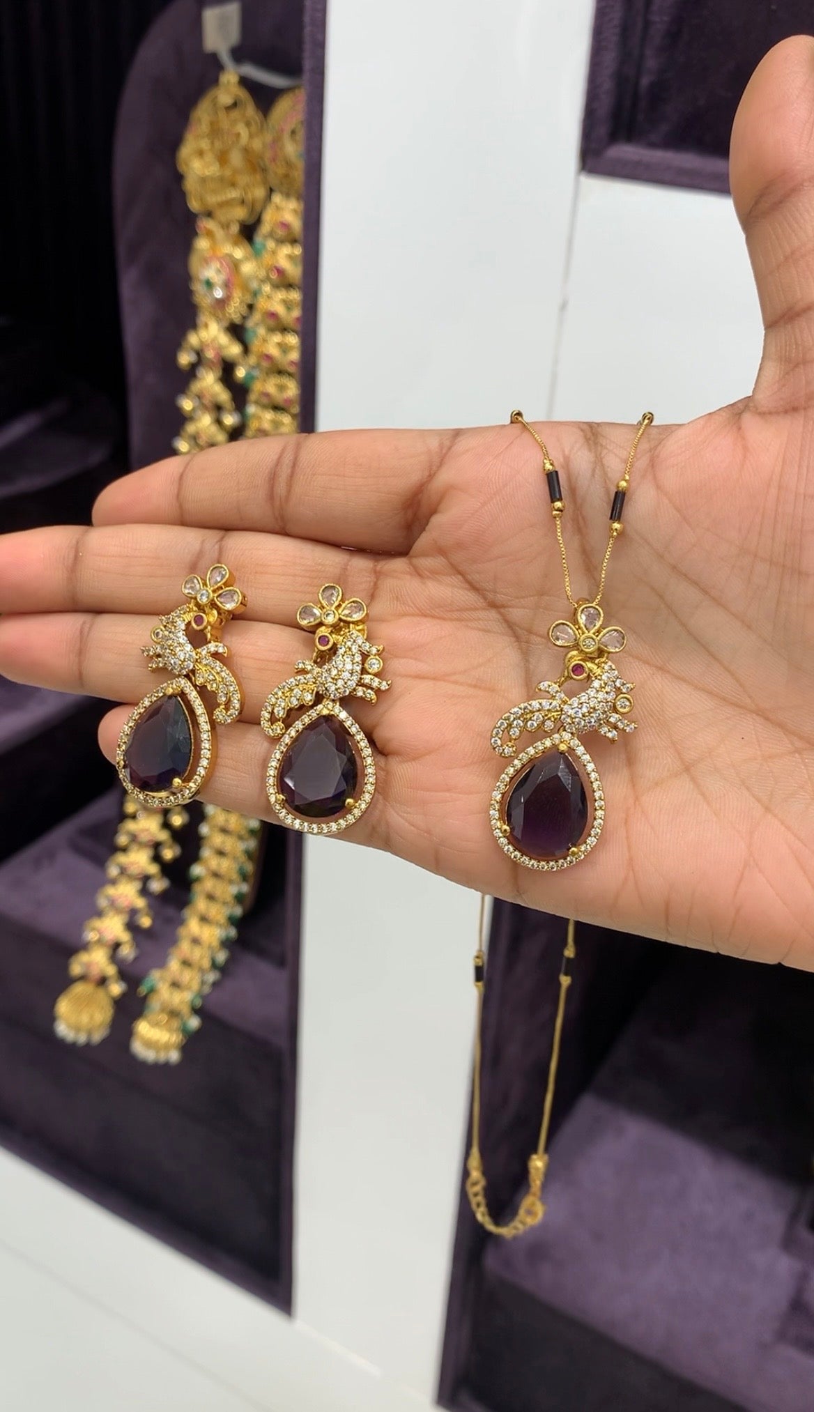 Beautiful purple color pendant set with black beads chain 18 inchs long