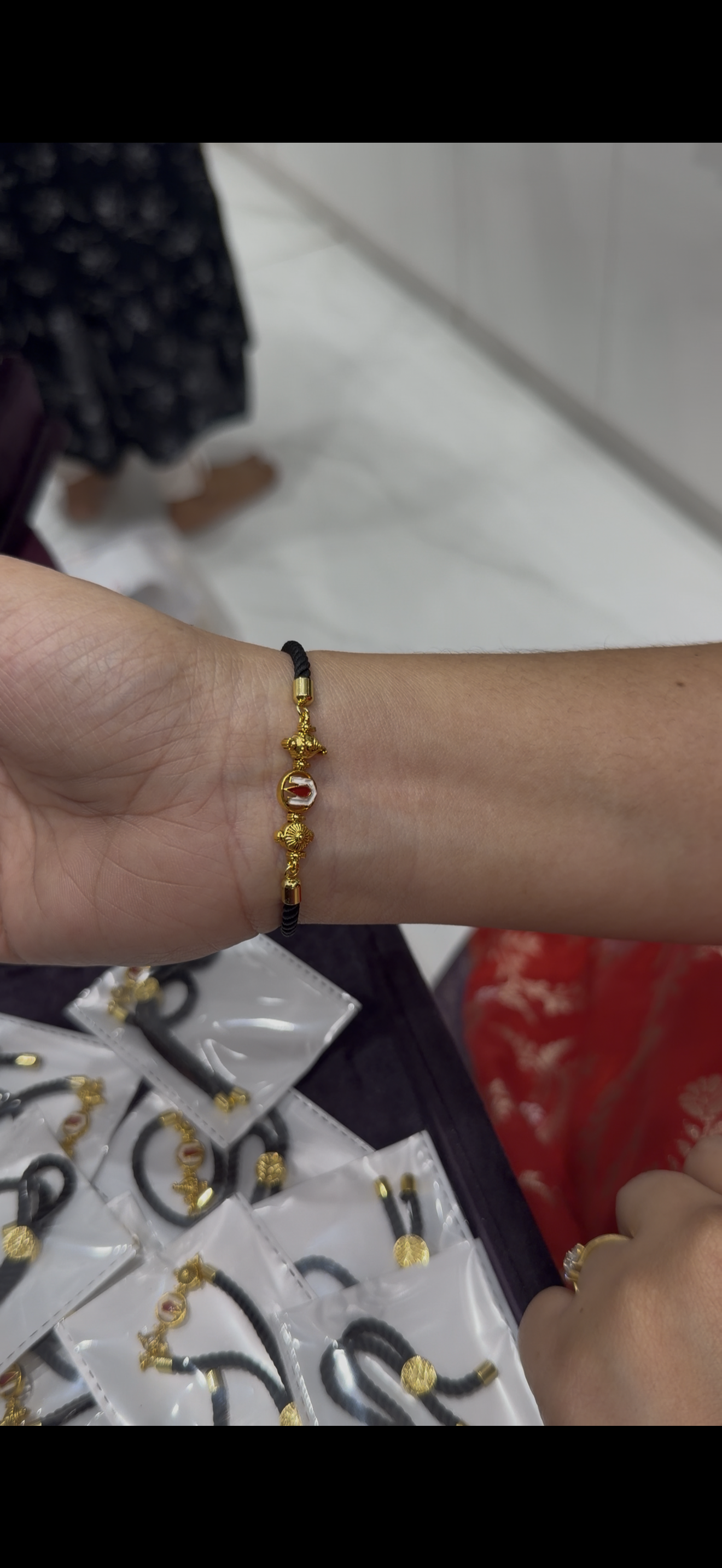 Black thread bracelet