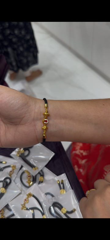 Black thread bracelet